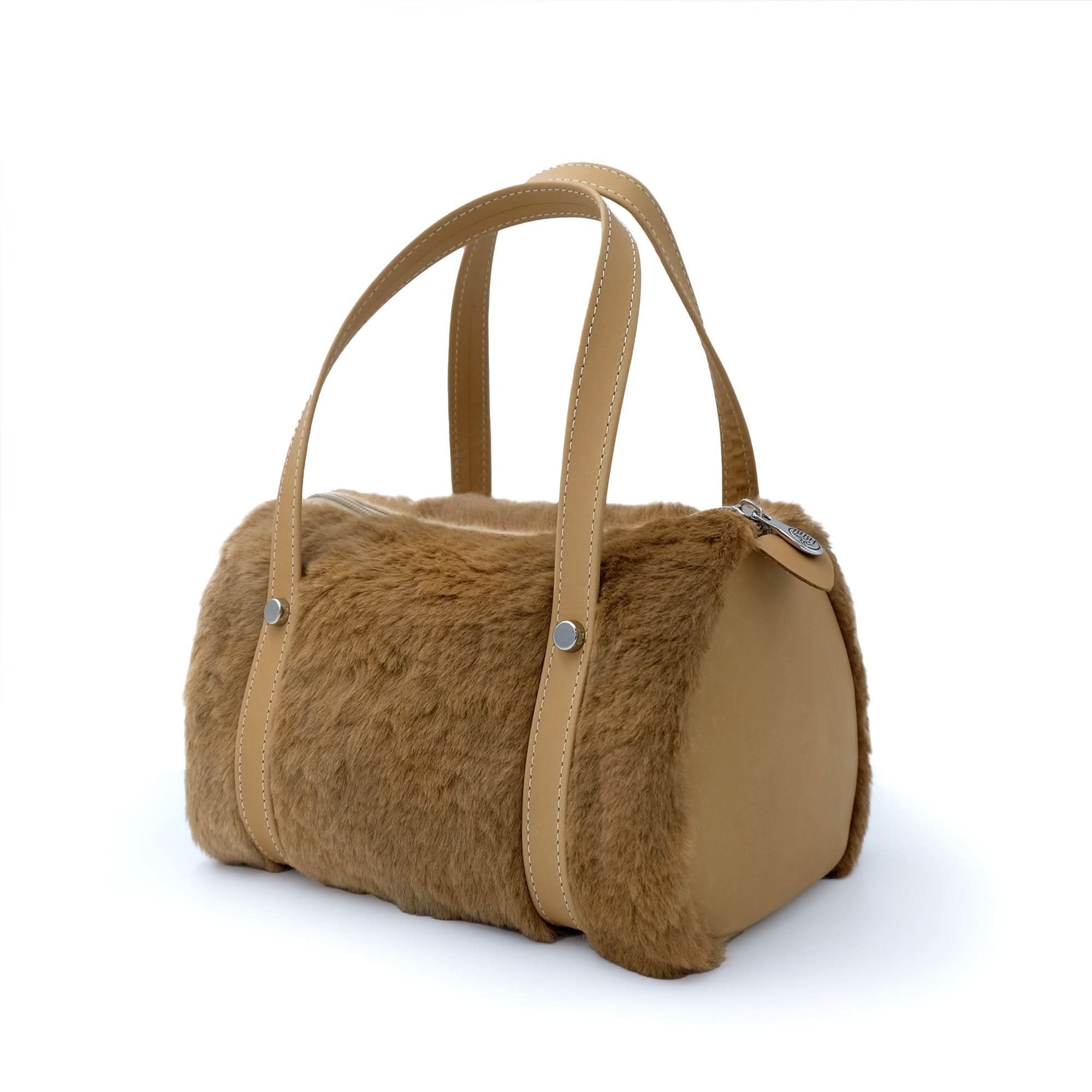 Caramel sheepskin fur handbag with leather handles, front view. - Yellow Earth Australia