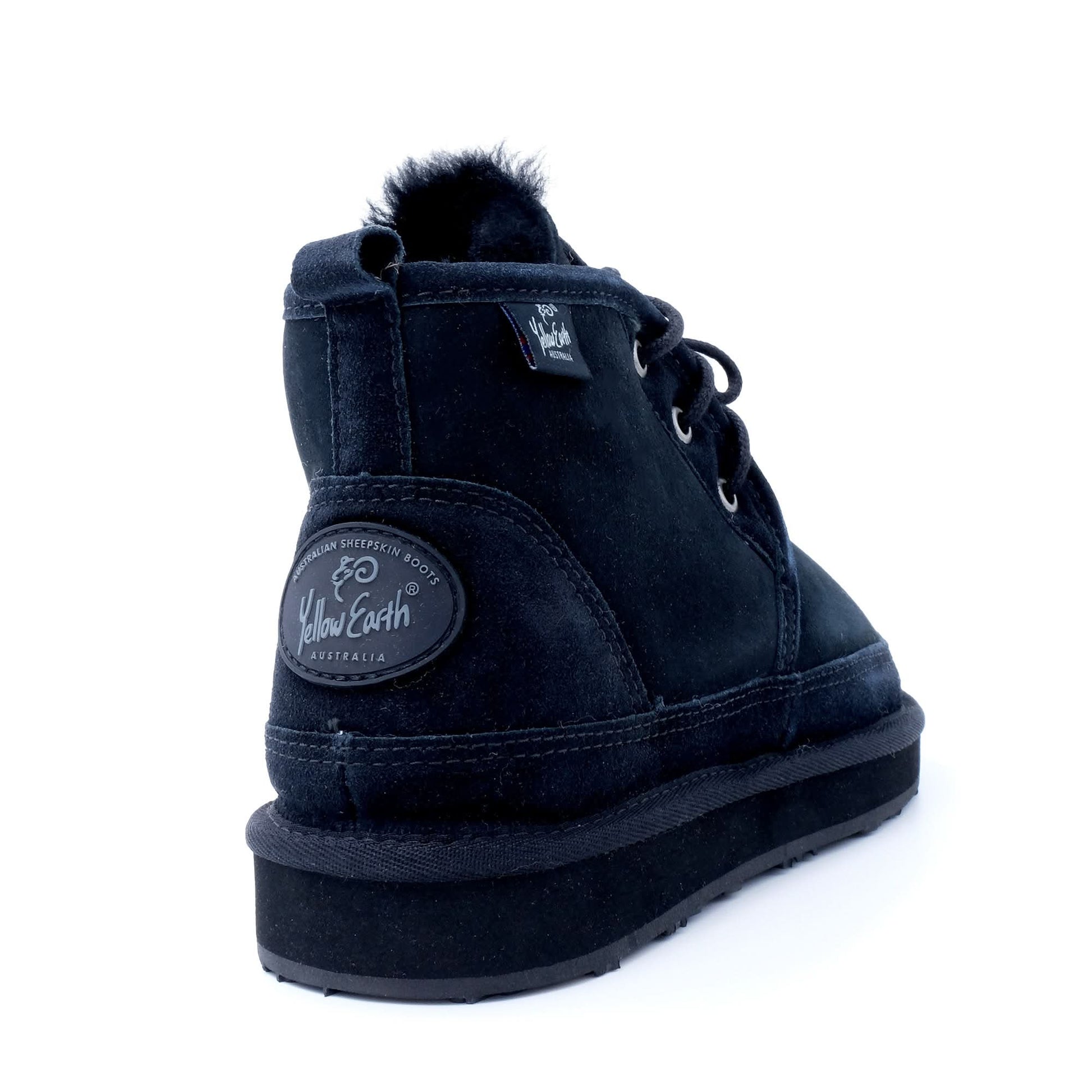 Black sheepskin lace-up boot with wool lining, rear three-quarter view. - Yellow Earth Australia
