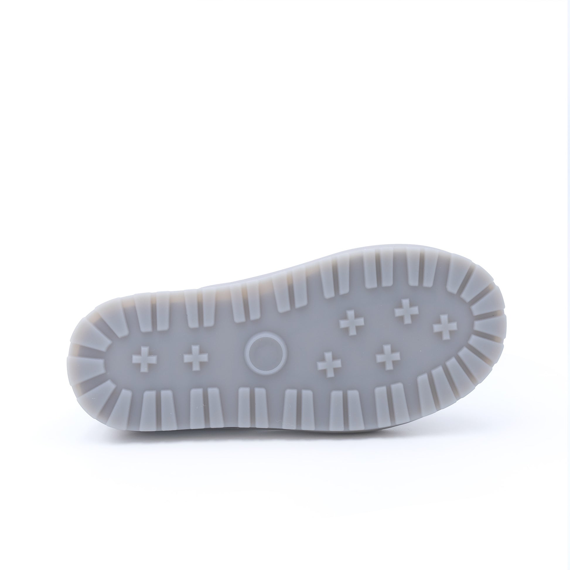 Translucent rubber shoe sole with plus symbols and center circle detail, bottom view. - Yellow Earth Australia
