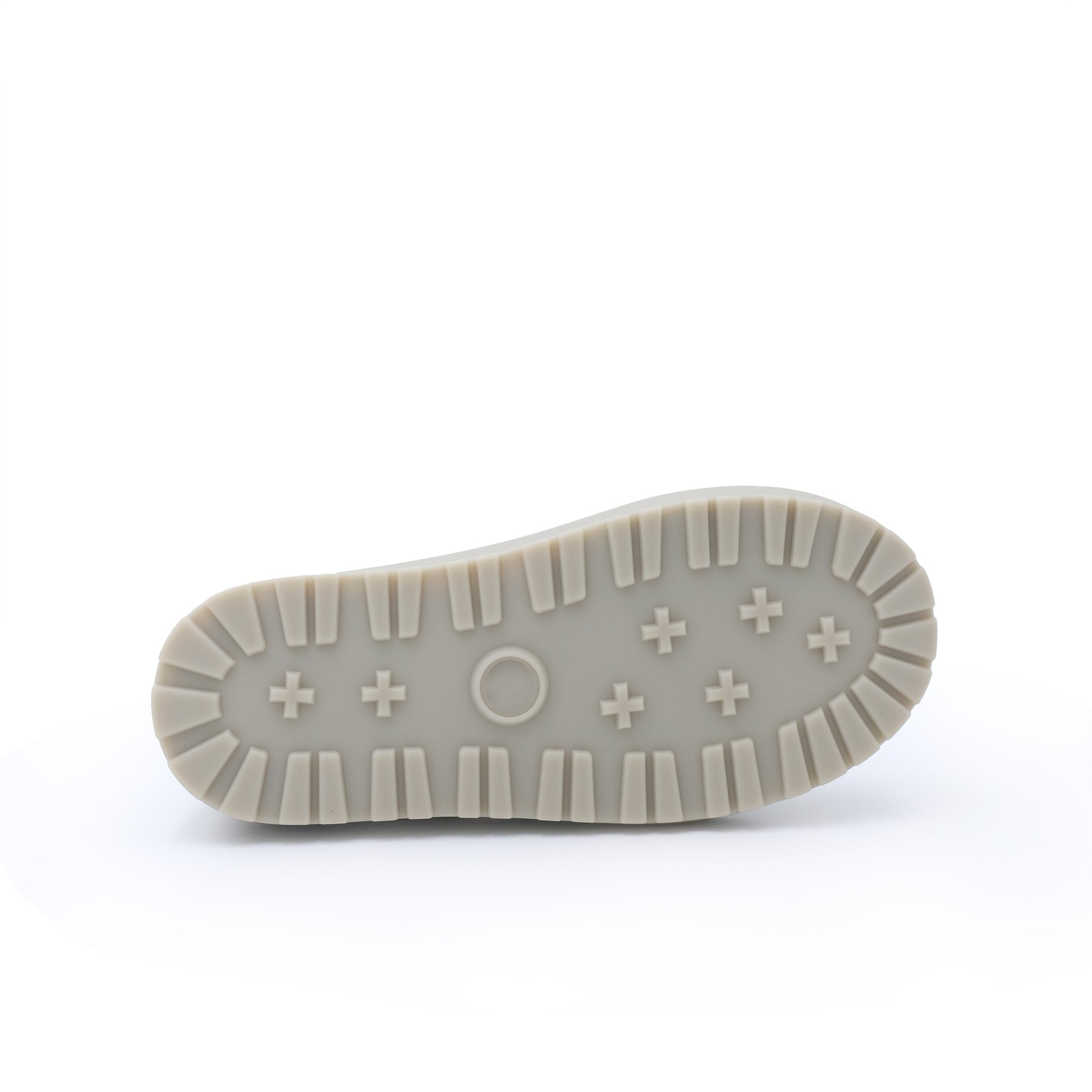 Cream sheepskin boot sole showing tread pattern and textured grip from bottom view. - Yellow Earth Australia