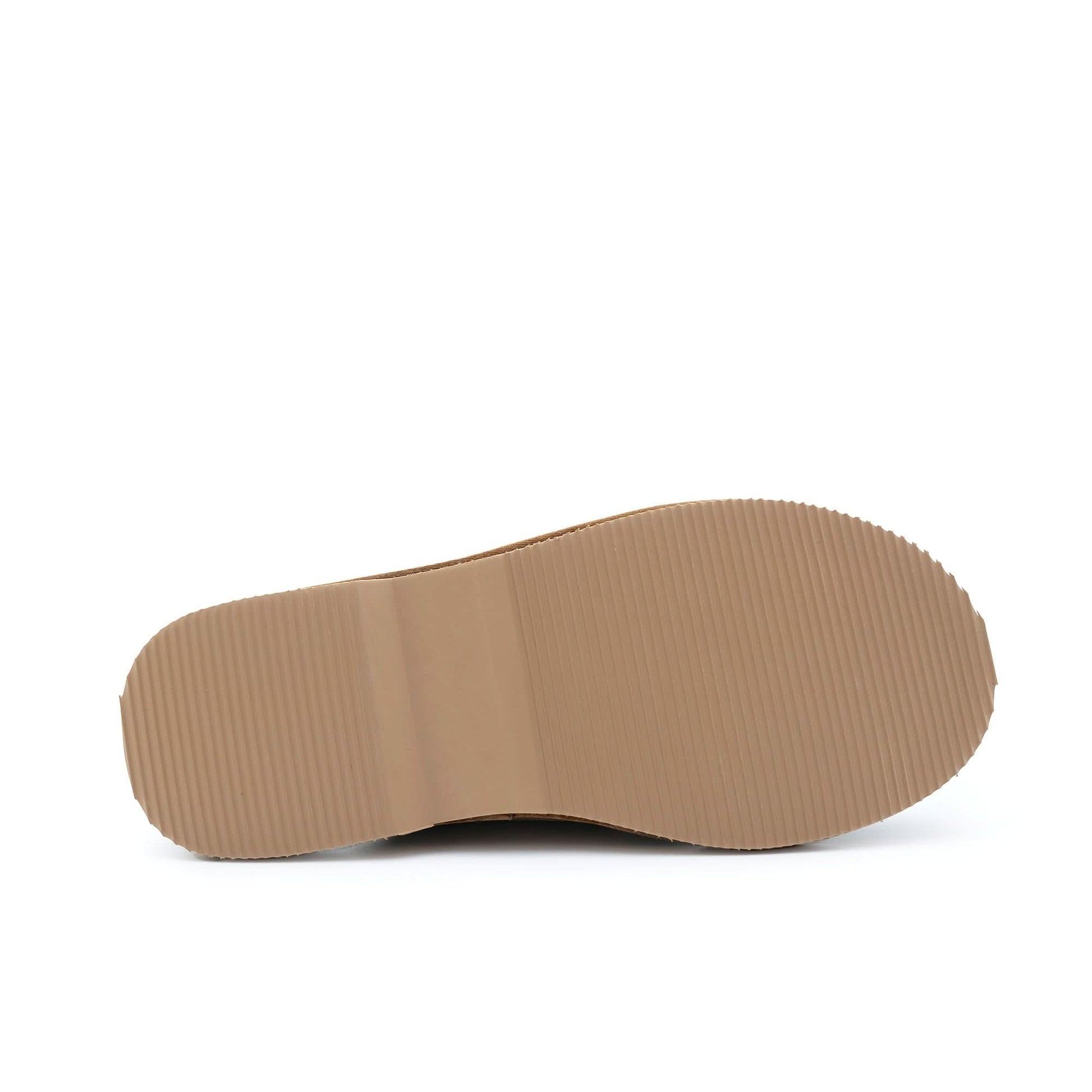 Beige crepe sole sheepskin slipper viewed from underneath showing textured rubber base. - Yellow Earth Australia