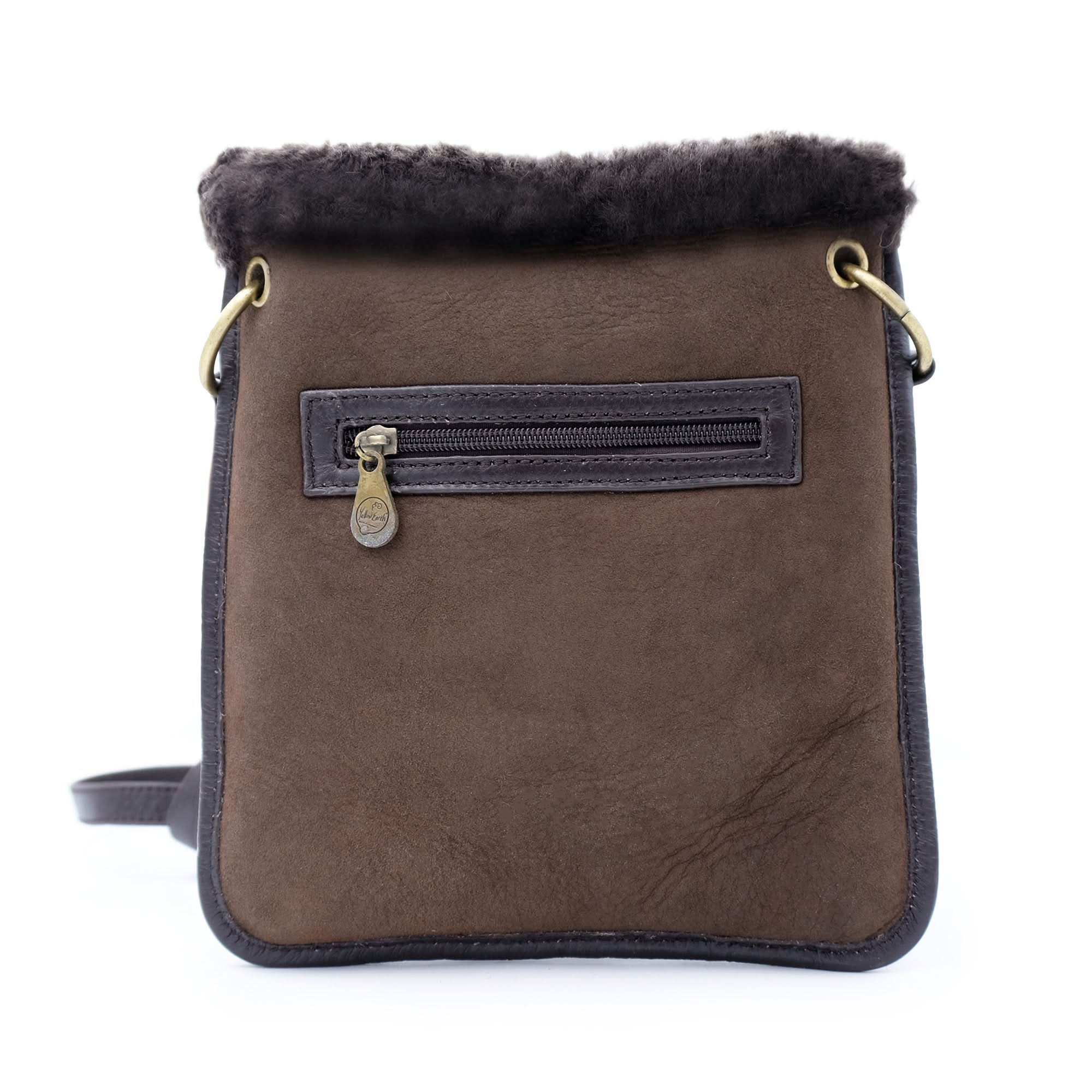 Small brown sheepskin shoulder bag with dark trim and fur collar, front view. - Yellow Earth Australia