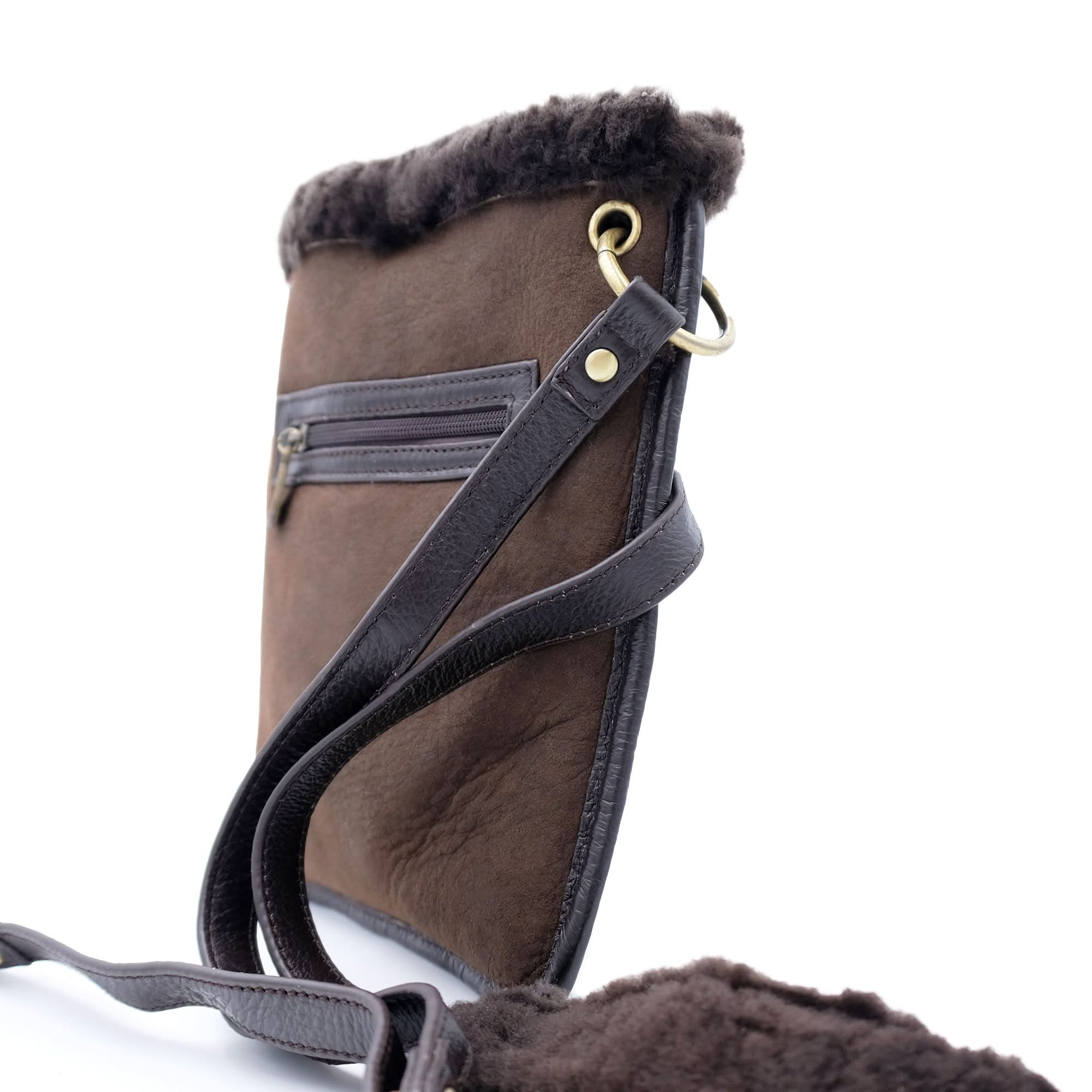 Brown sheepskin boot with black leather trim and fur lining, side view. - Yellow Earth Australia