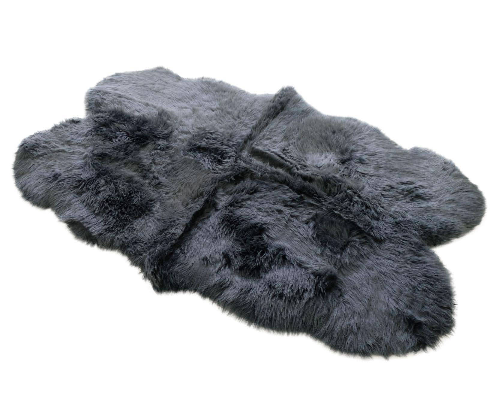 Dark grey sheepskin rug with soft wool texture displayed from above on white background. - Yellow Earth Australia