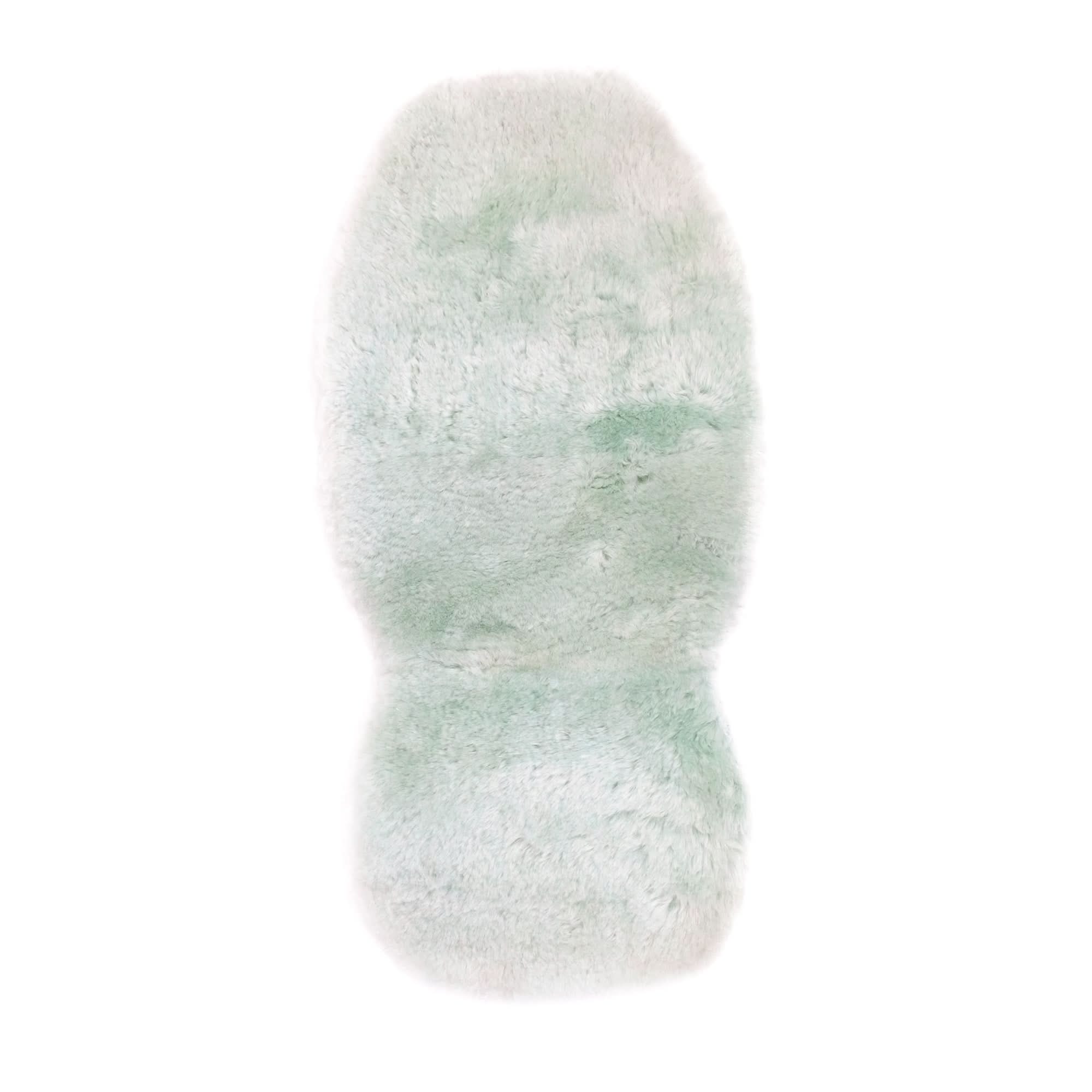 Soft fluffy sheepskin rug in cream and sage green tones, viewed from above. - Yellow Earth Australia