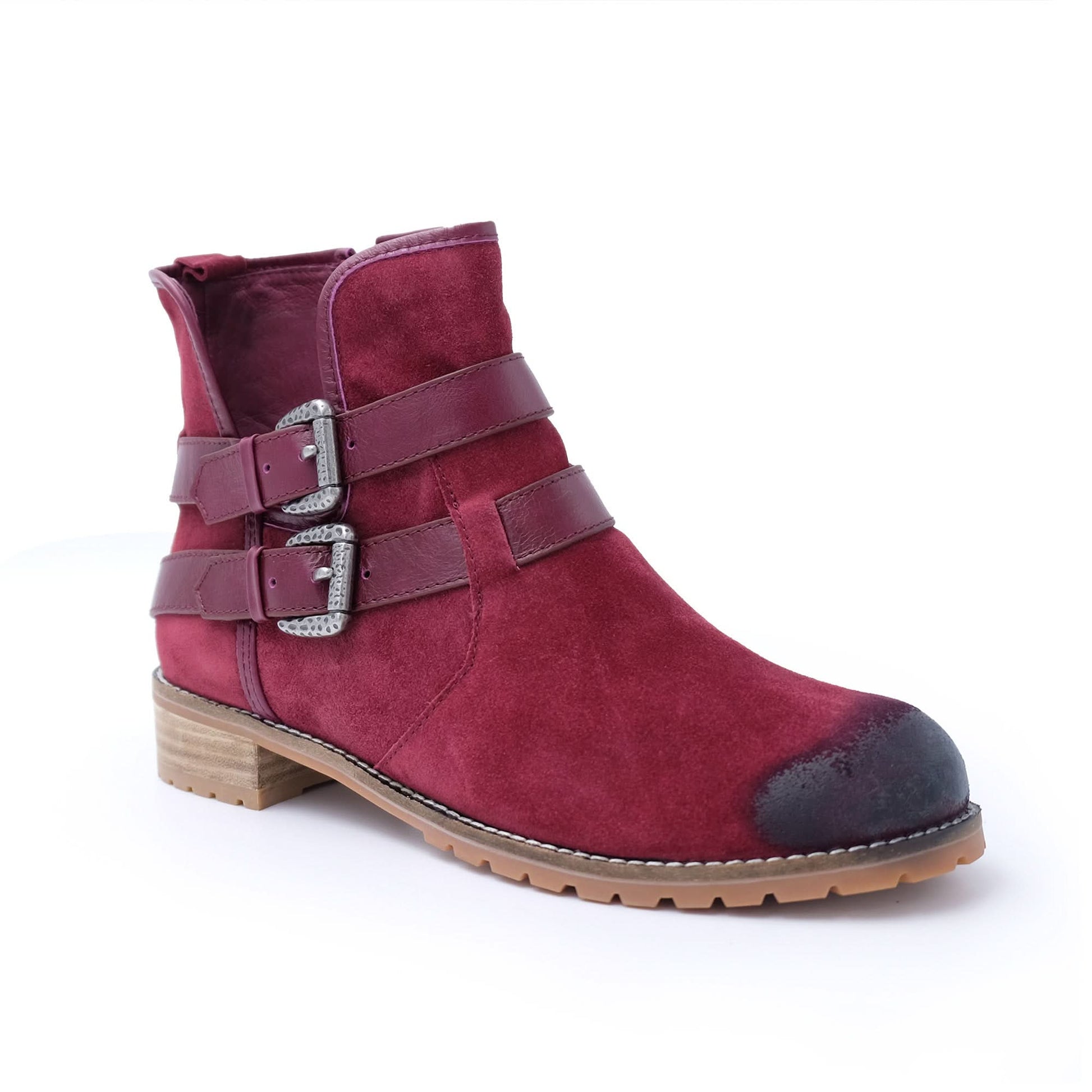 Burgundy suede ankle boot with buckle straps and lug sole, side view. - Yellow Earth Australia