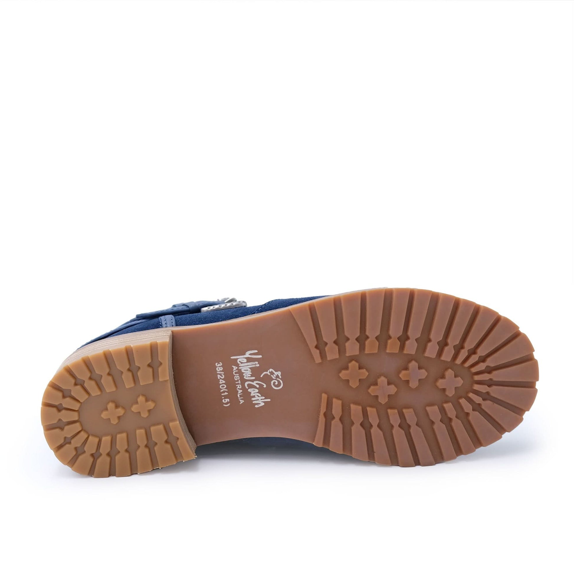 Close-up of navy blue boot with tan treaded sole, durable outdoor footwear