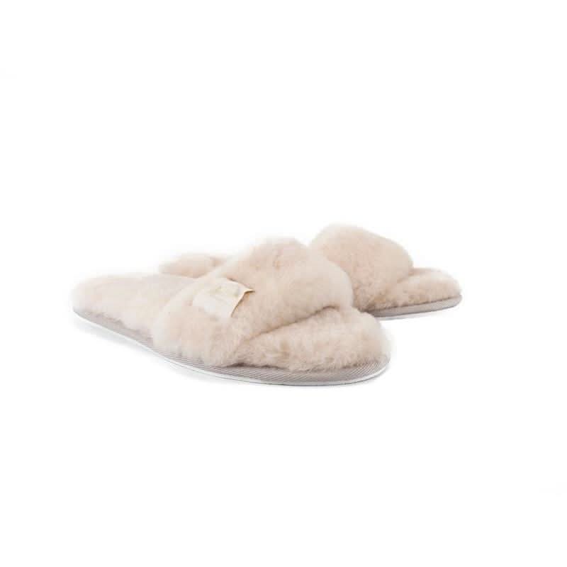 Cream sheepskin slippers with wool lining, top view on white background. - Yellow Earth Australia