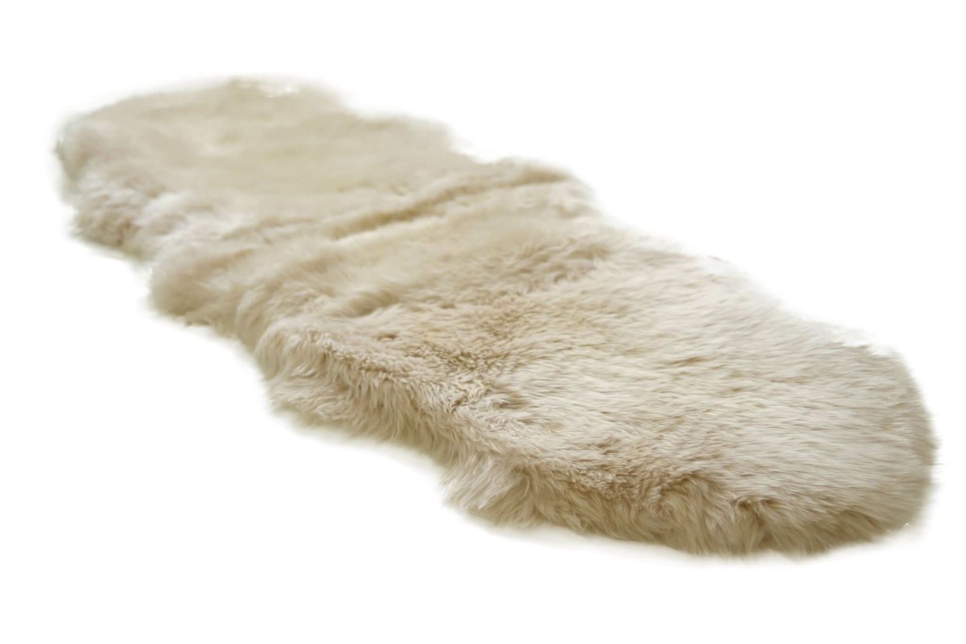 Cream sheepskin rug with soft wool pile photographed from above on white background. - Yellow Earth Australia