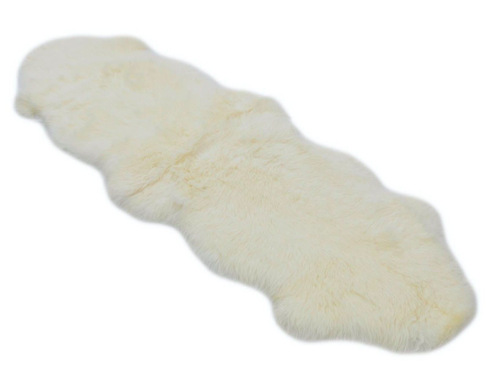 Ivory sheepskin rug with soft wool fleece, top-down view. - Yellow Earth Australia