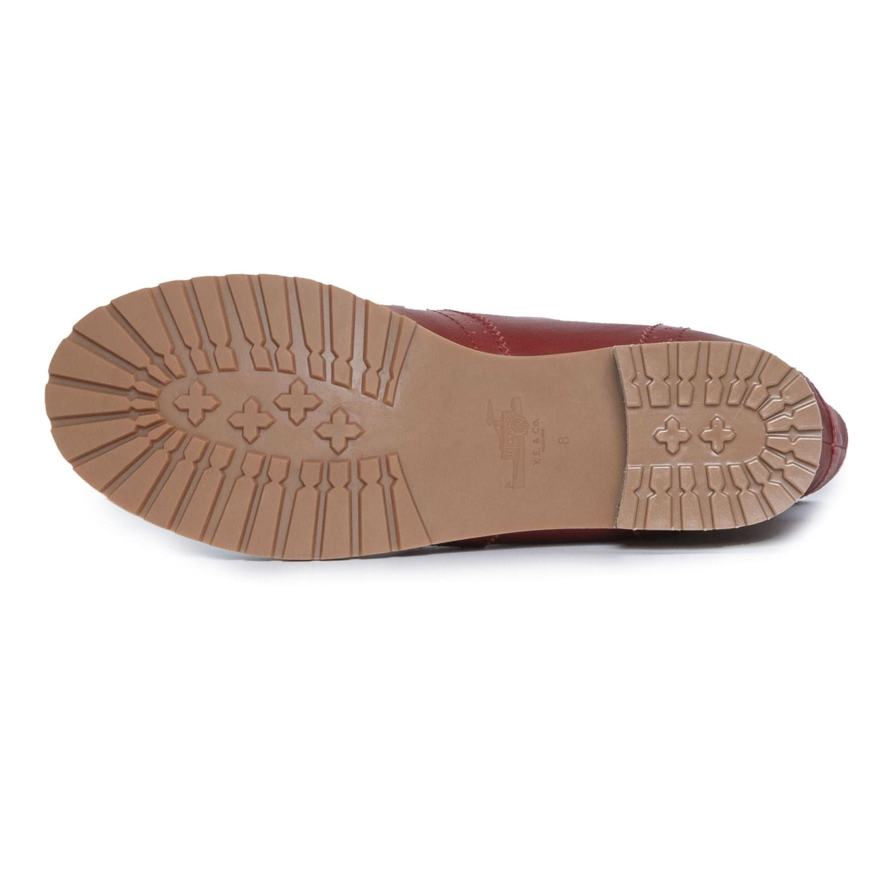 Burgundy leather loafer sole view showing tan crepe rubber outsole with decorative stitching. - Yellow Earth Australia