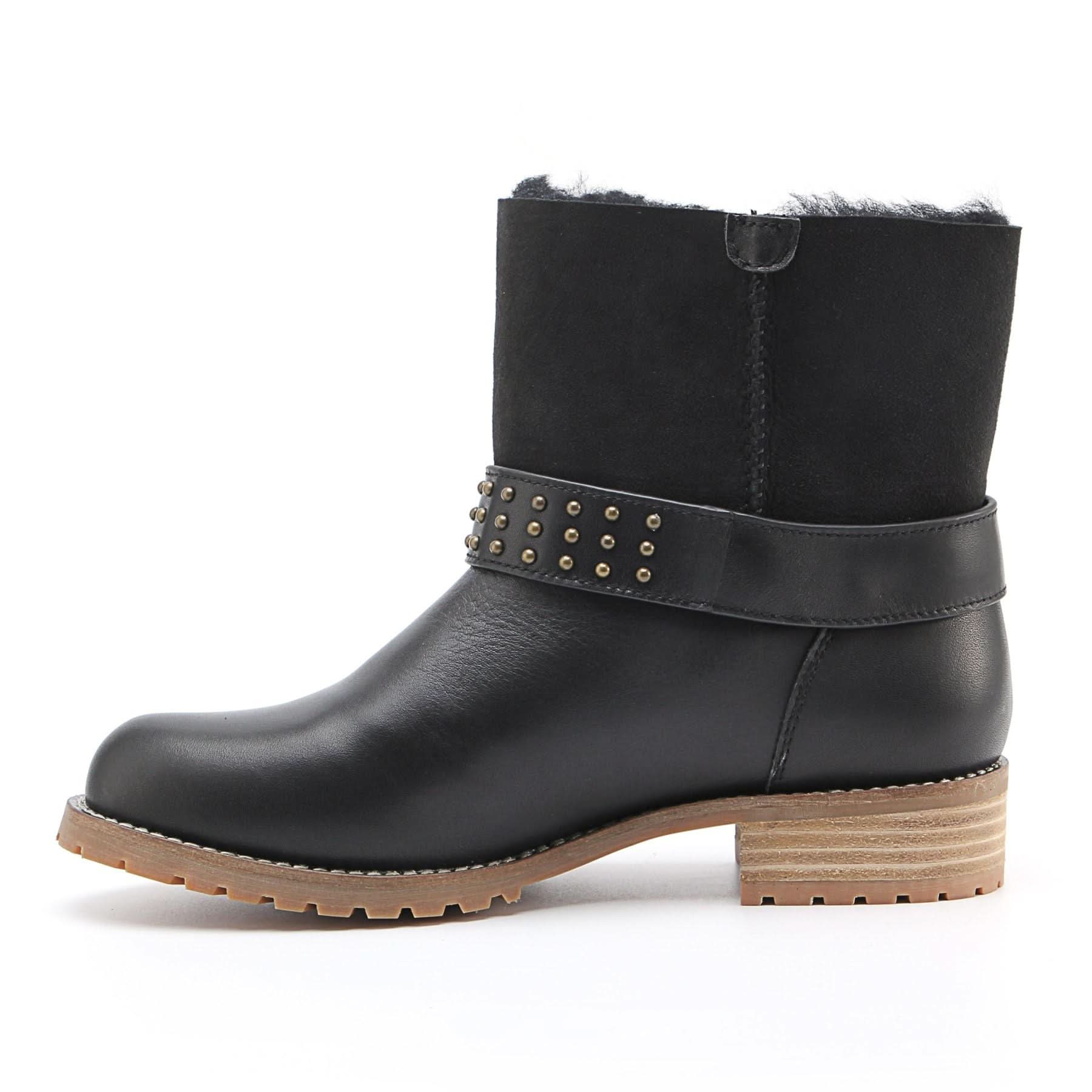 Black sheepskin ankle boot with studded leather strap and chunky sole, side view. - Yellow Earth Australia