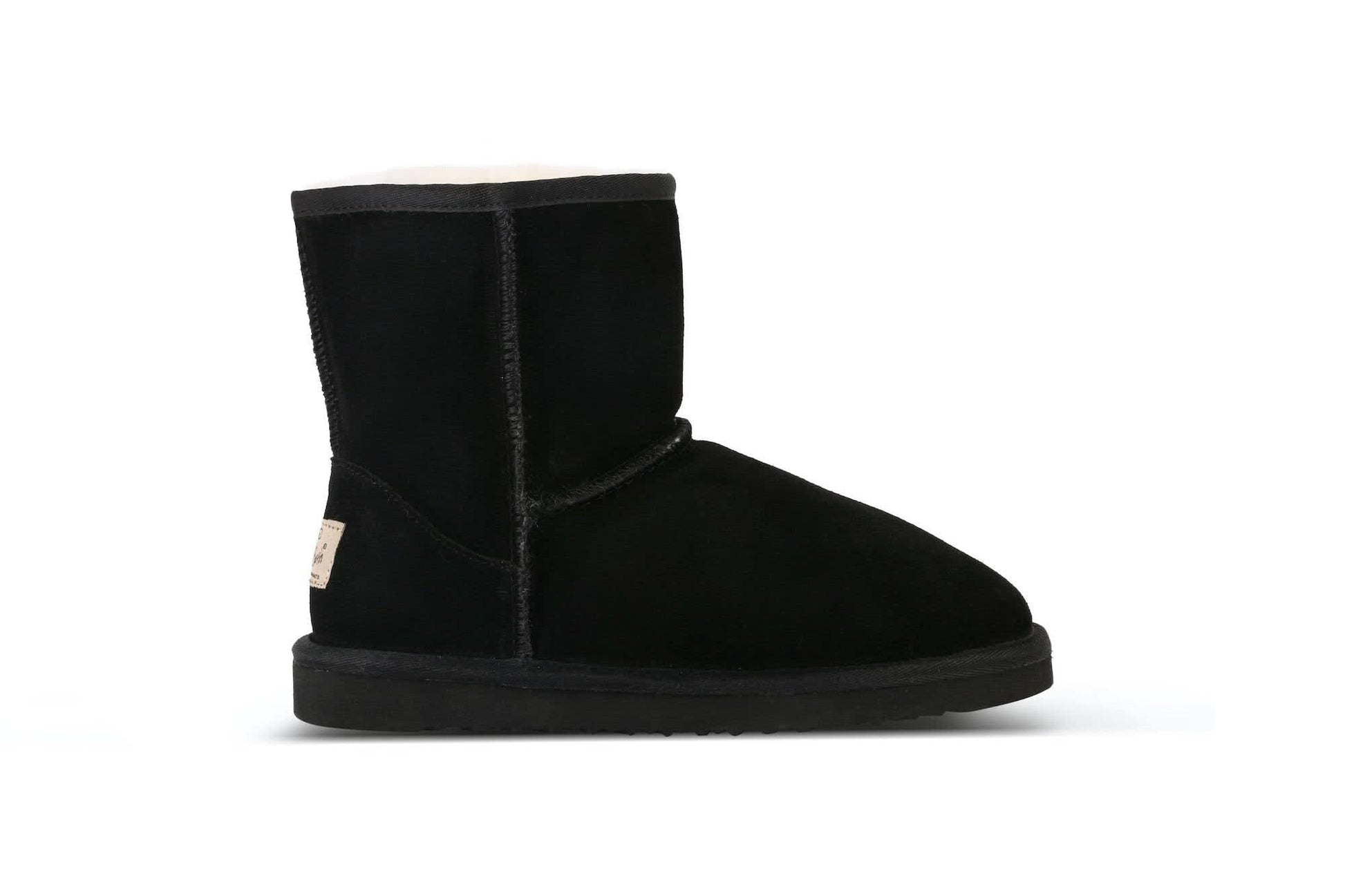 Black sheepskin short boots with soft wool lining, side view. - Yellow Earth Australia