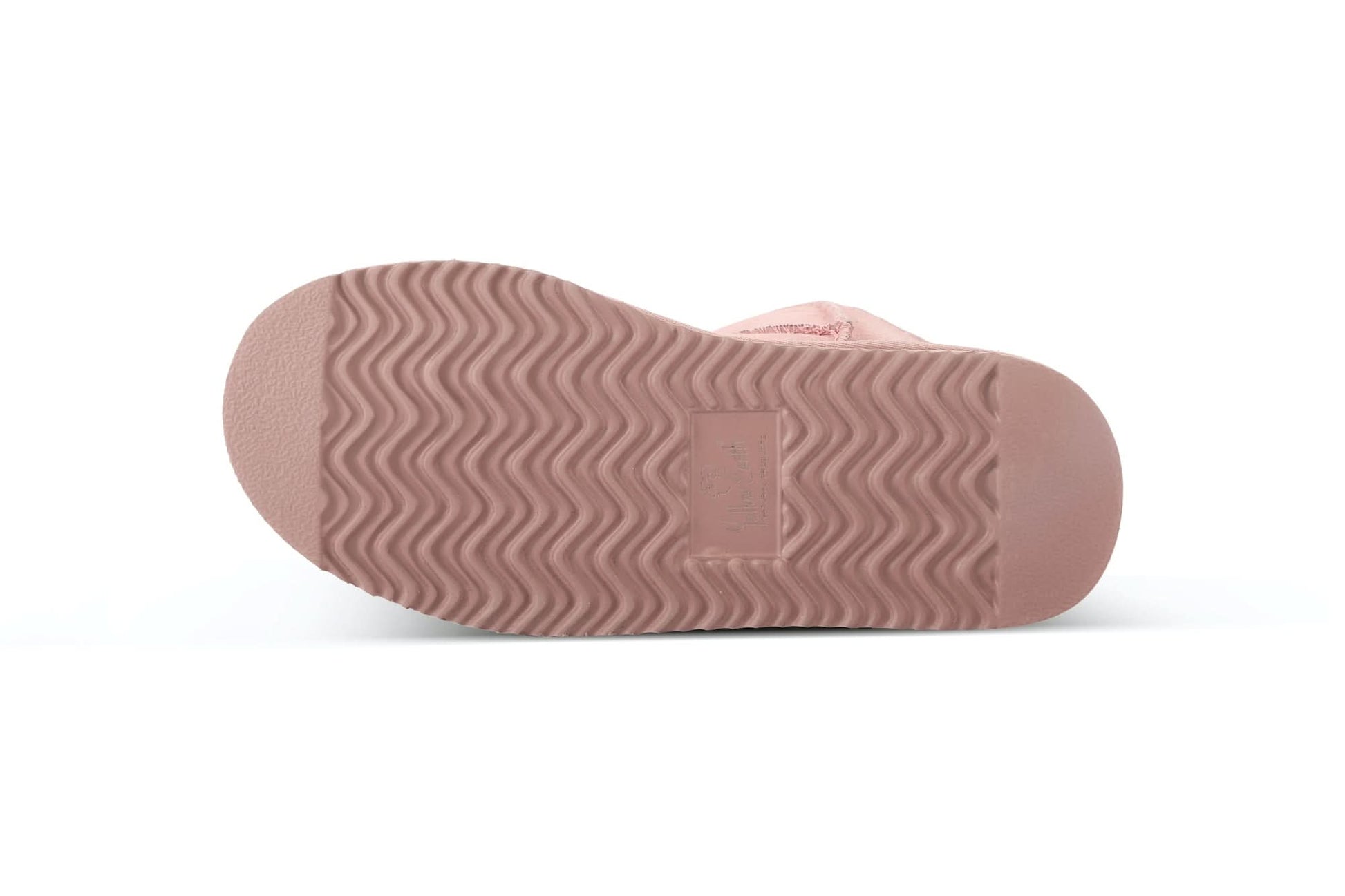 Pink sheepskin slipper sole showing wavy tread pattern from above. - Yellow Earth Australia