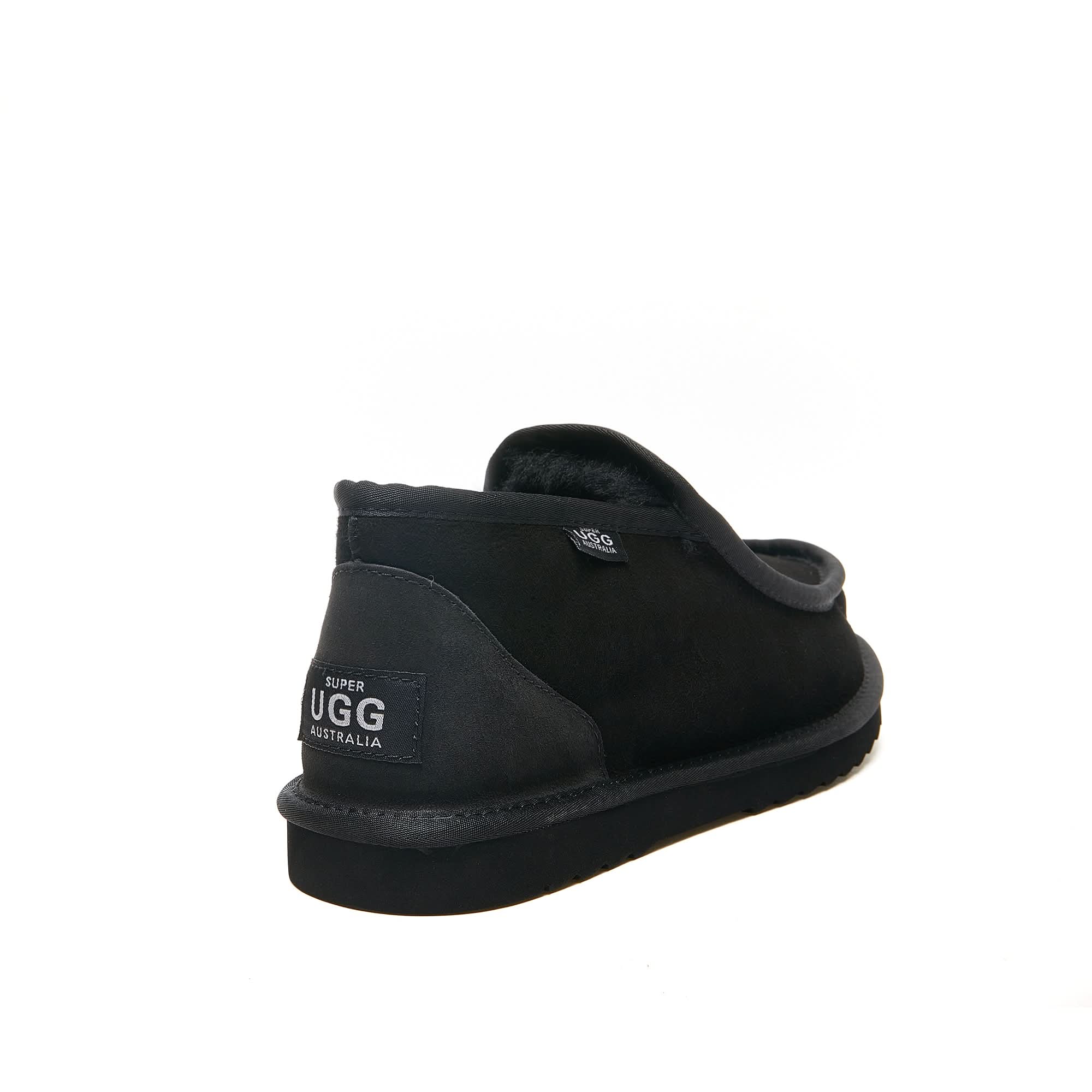 Black sheepskin and suede slip-on boot shown from rear angle view. - Yellow Earth Australia