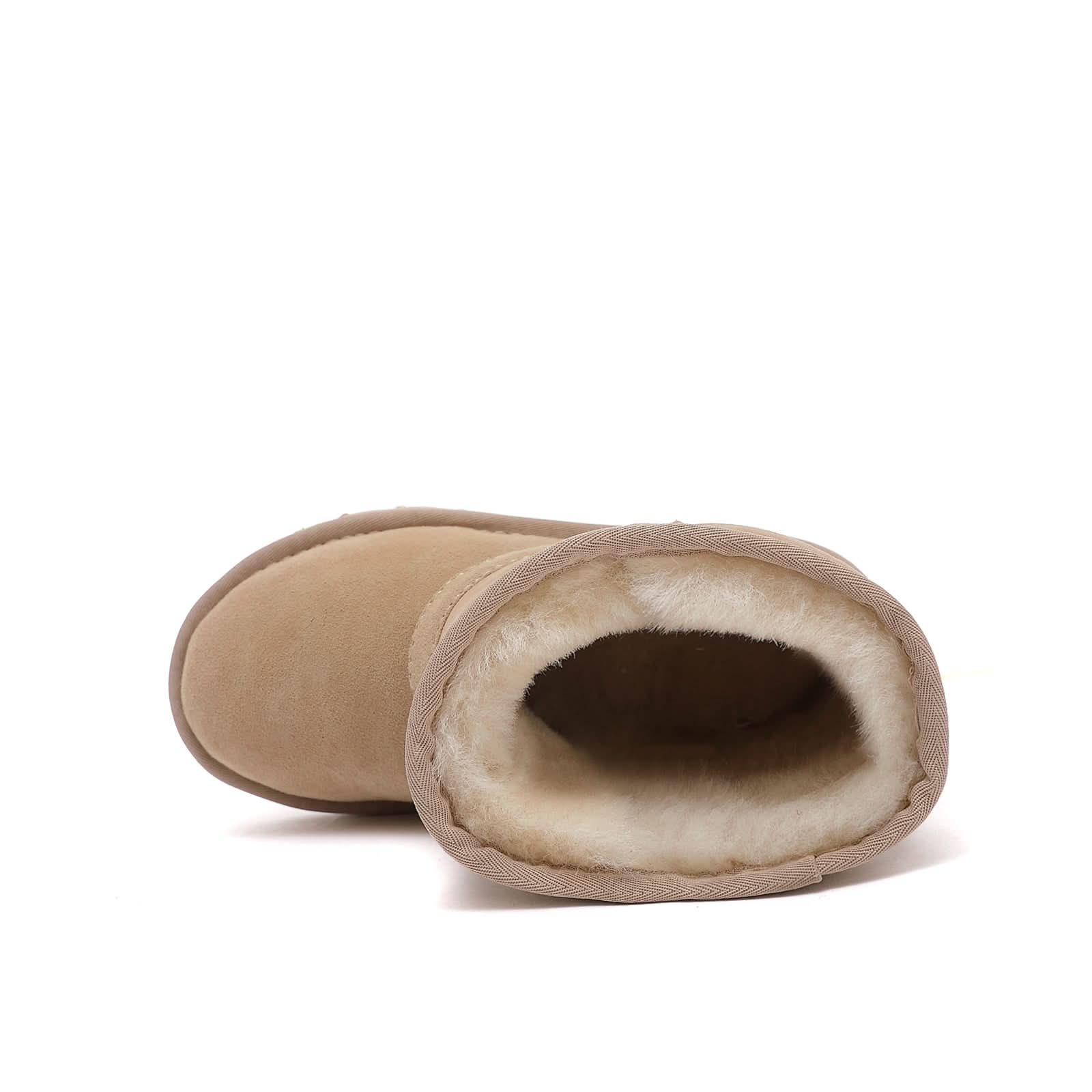 Beige sheepskin boot with fluffy wool lining, top-down view showing interior. - Yellow Earth Australia