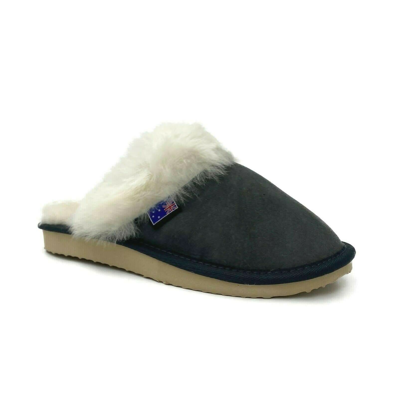 Black sheepskin slipper mule with white fur collar, shown from side angle. - Yellow Earth Australia