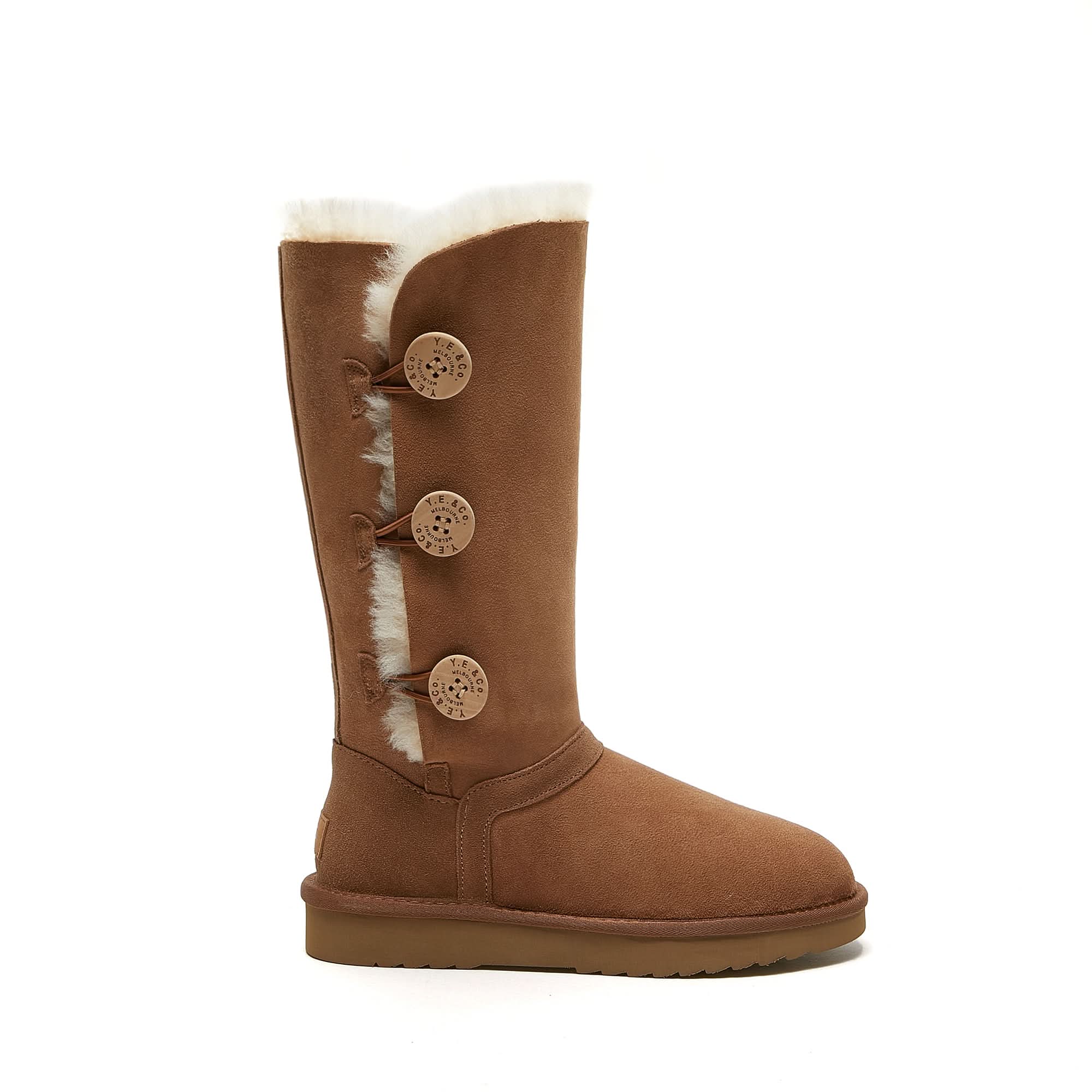 Chestnut sheepskin boot with three decorative buttons and fluffy wool lining, side view. - Yellow Earth Australia