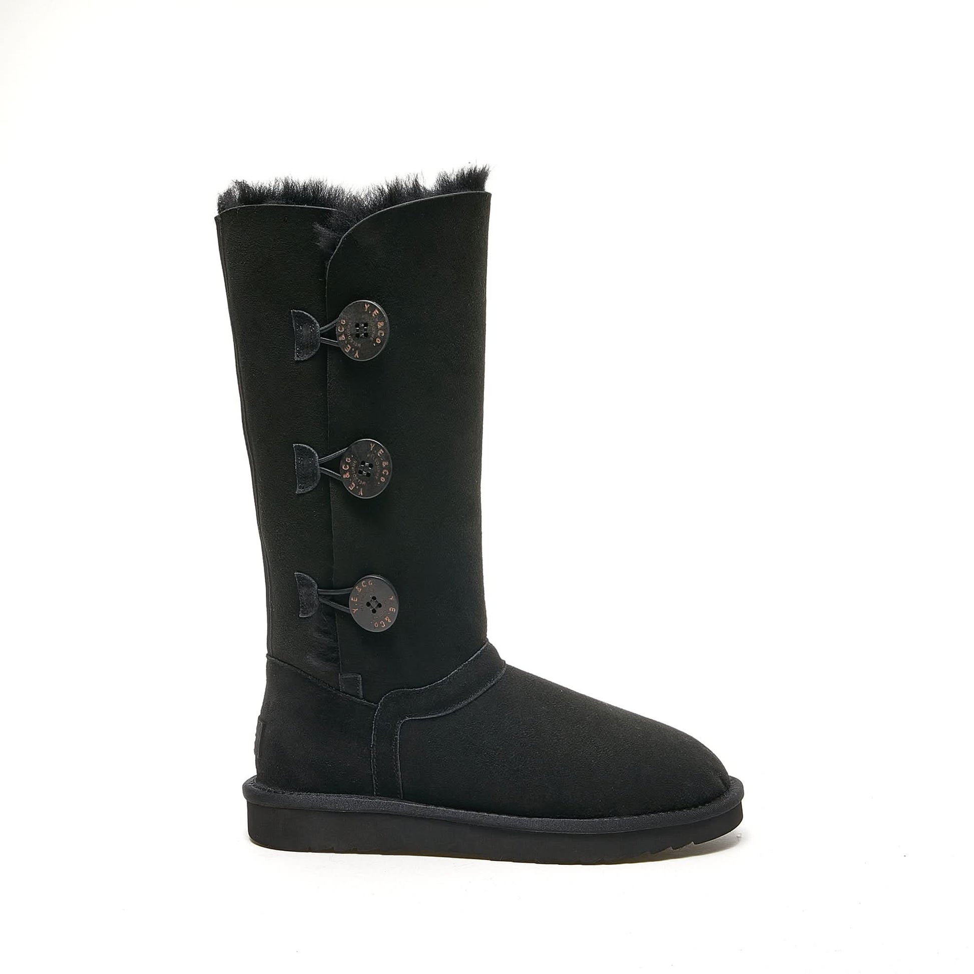 Black sheepskin tall boots with decorative button closures and fur trim, side view. - Yellow Earth Australia
