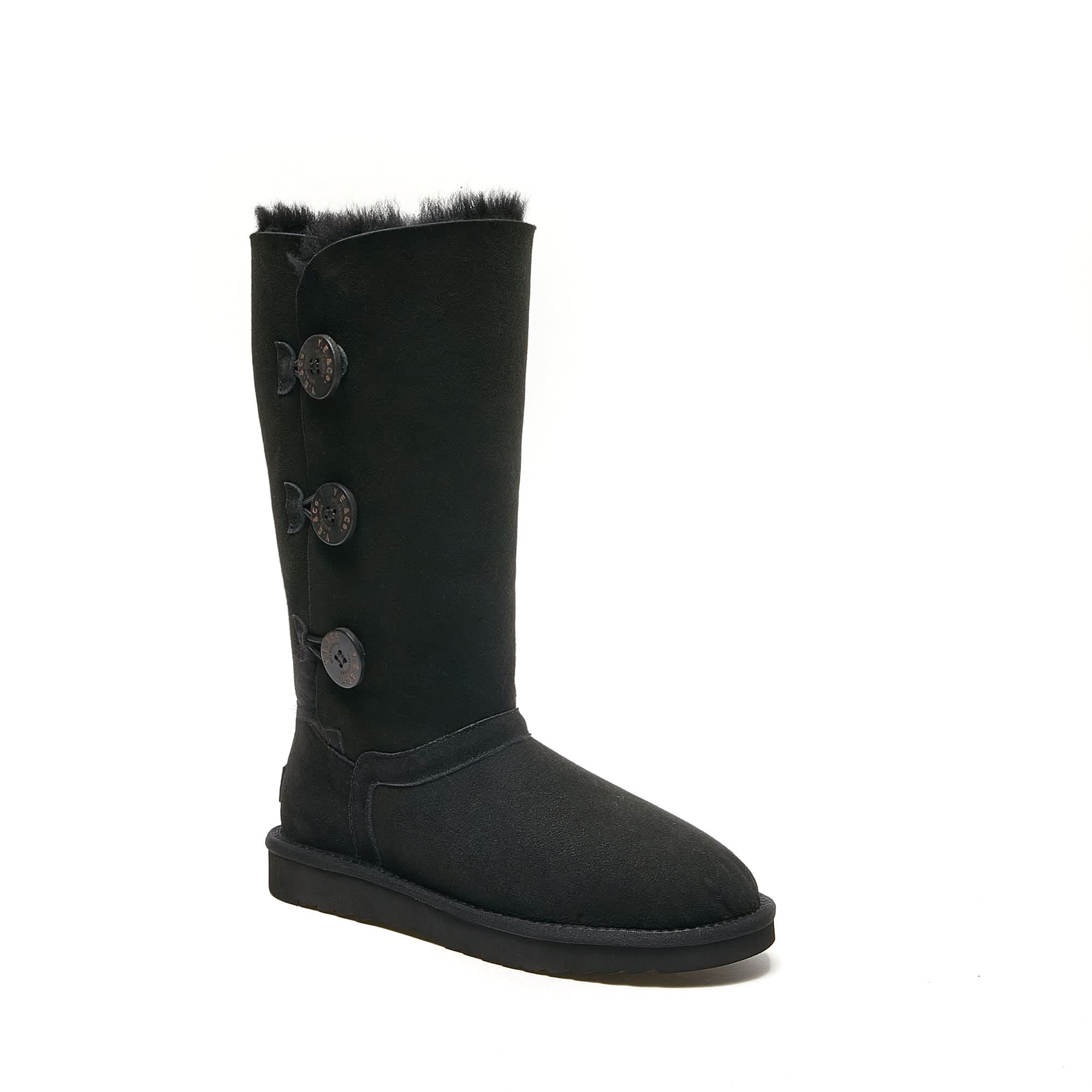 Black tall sheepskin boot with fur trim and decorative buttons, side view. - Yellow Earth Australia