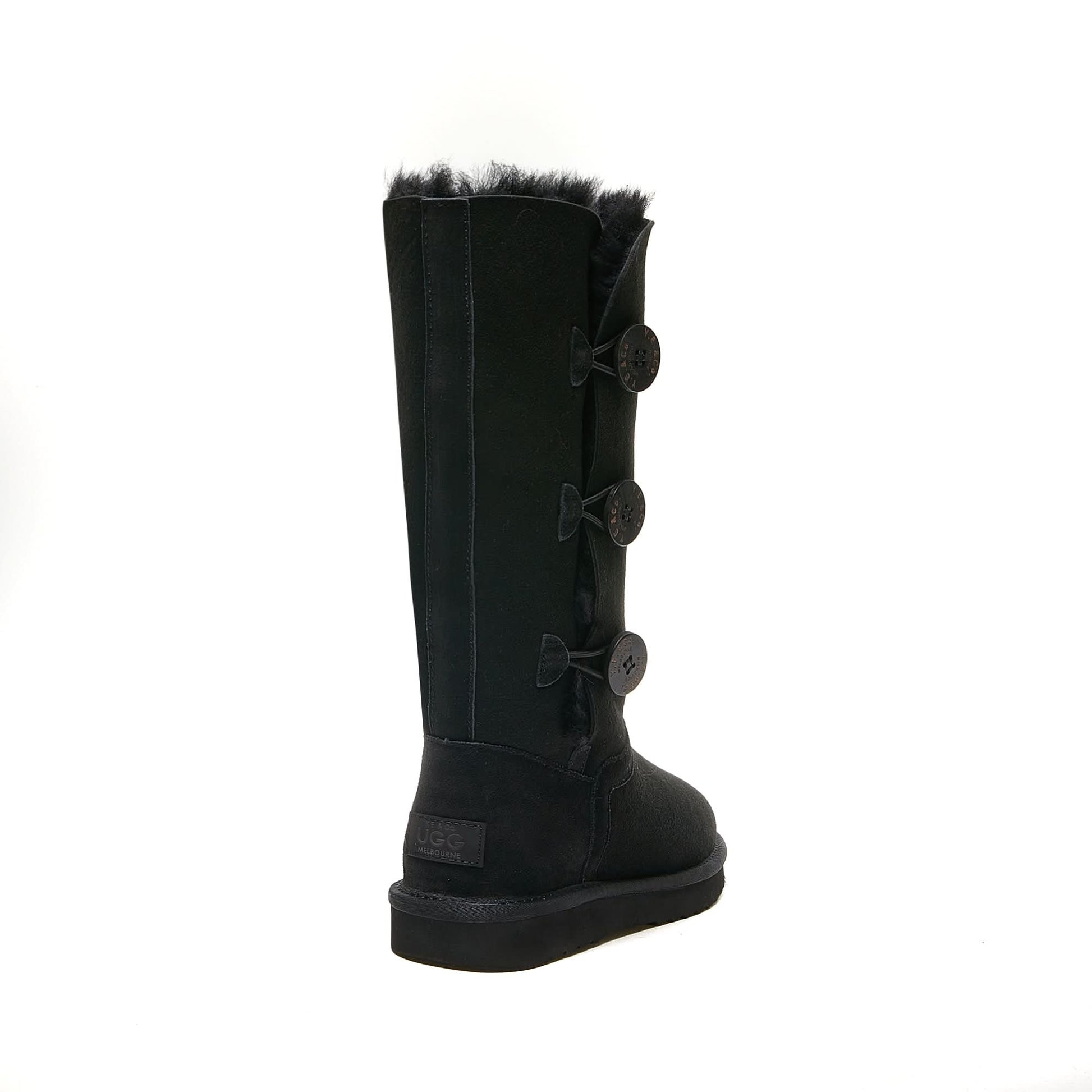 Black sheepskin tall boot with fur trim and button closures, side view. - Yellow Earth Australia