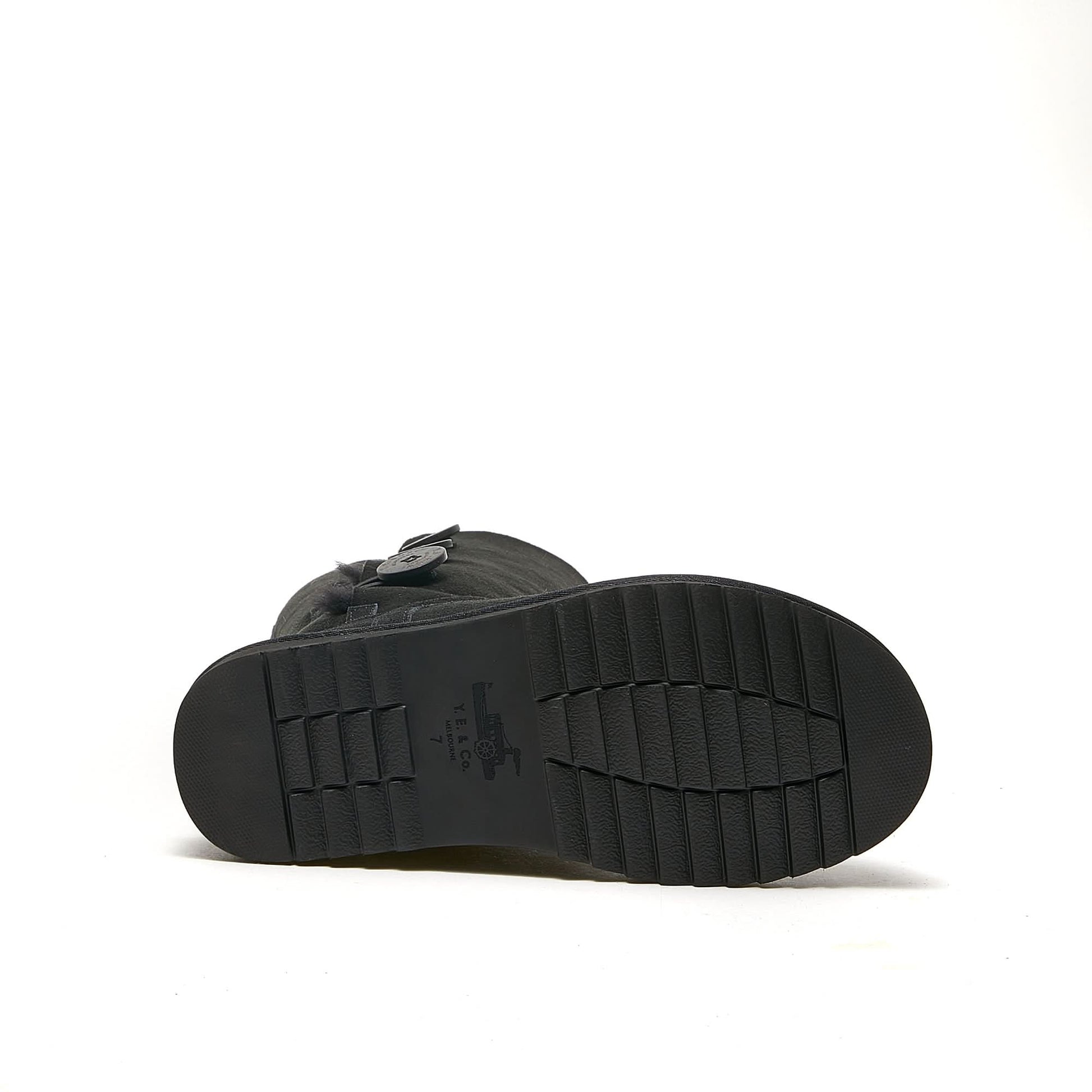 Black sheepskin ankle boot with textured sole, sole view. - Yellow Earth Australia