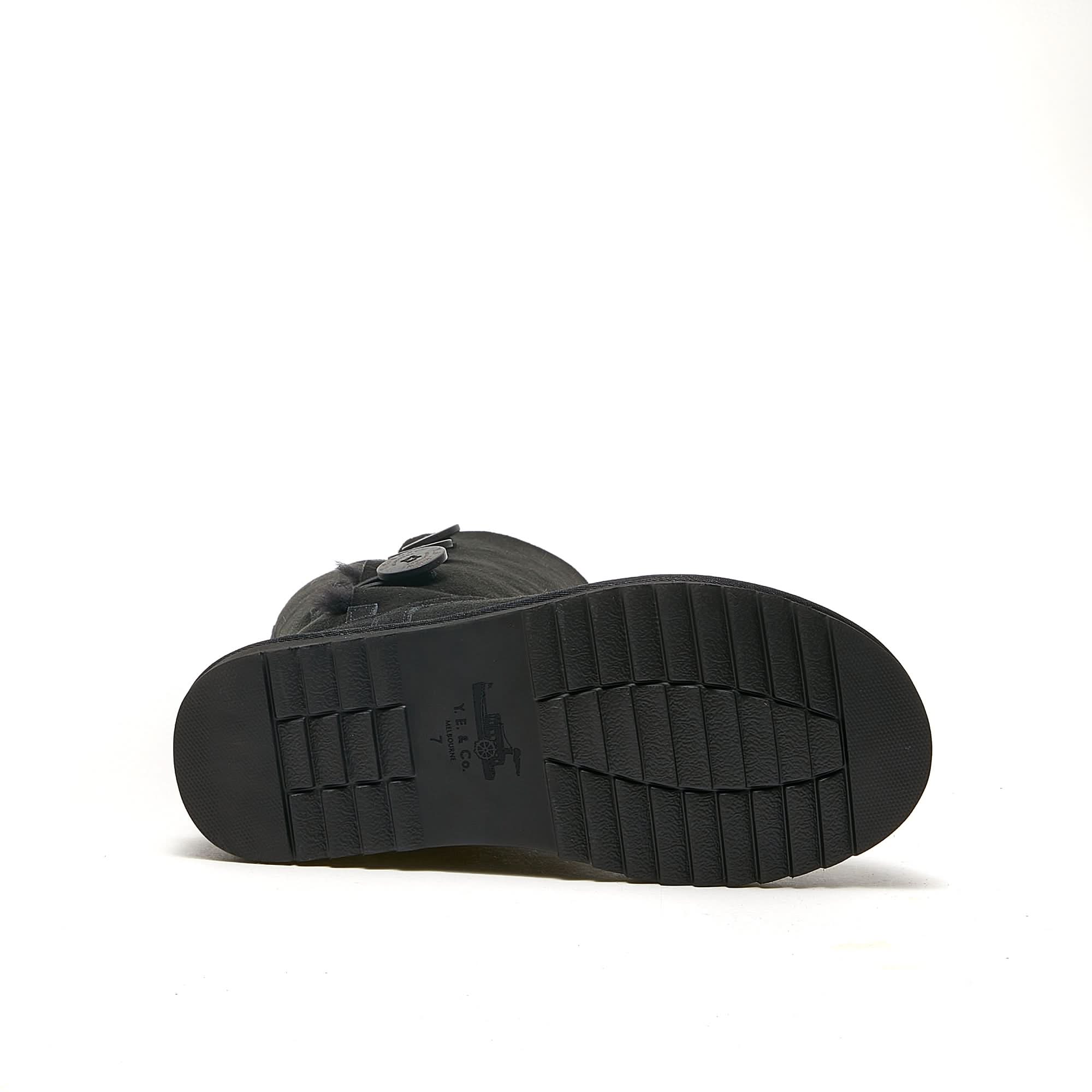 Black sheepskin ankle boot with textured sole, sole view. - Yellow Earth Australia
