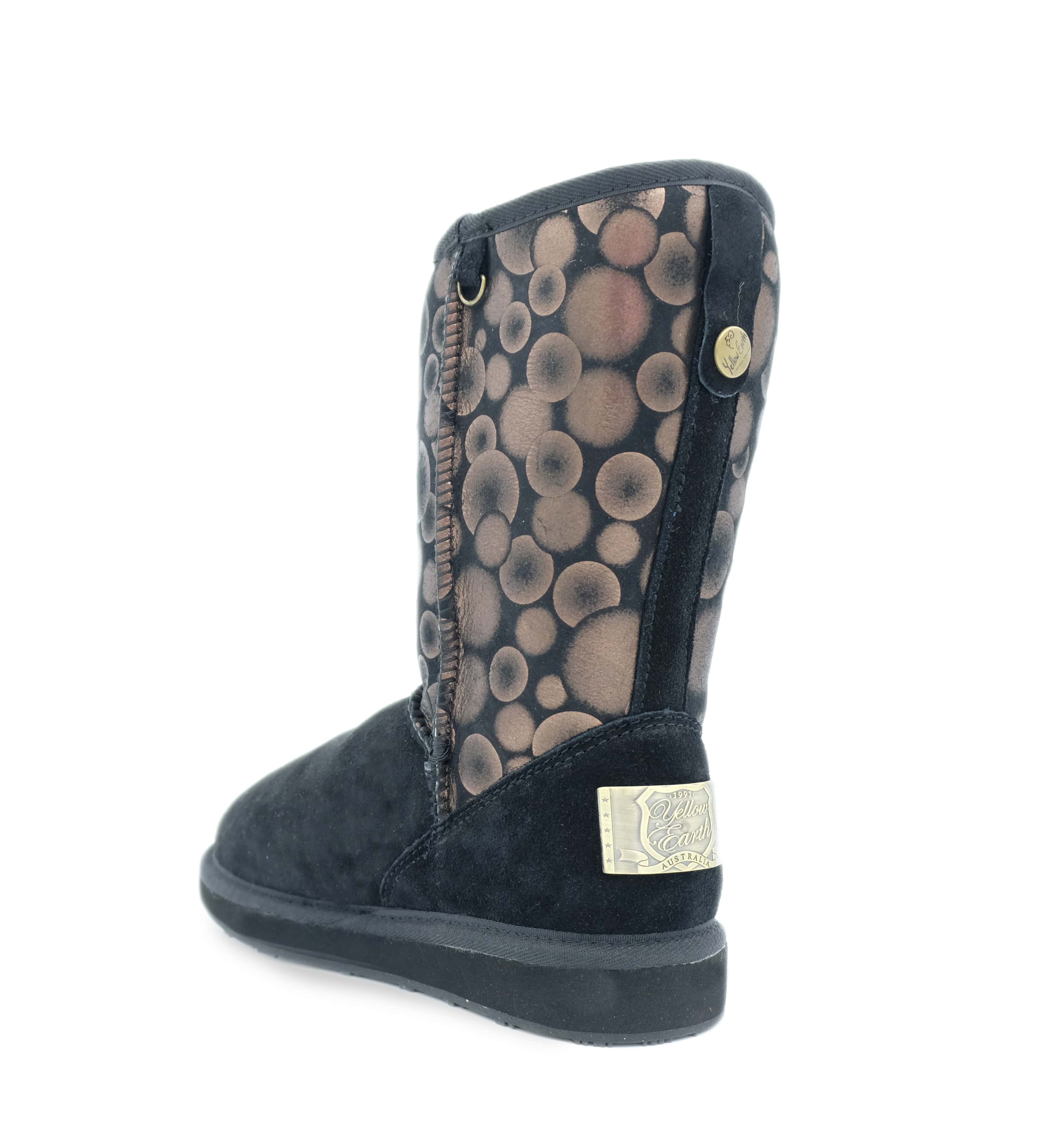 Black sheepskin boot with spotted wool lining, rear three-quarter view. - Yellow Earth Australia