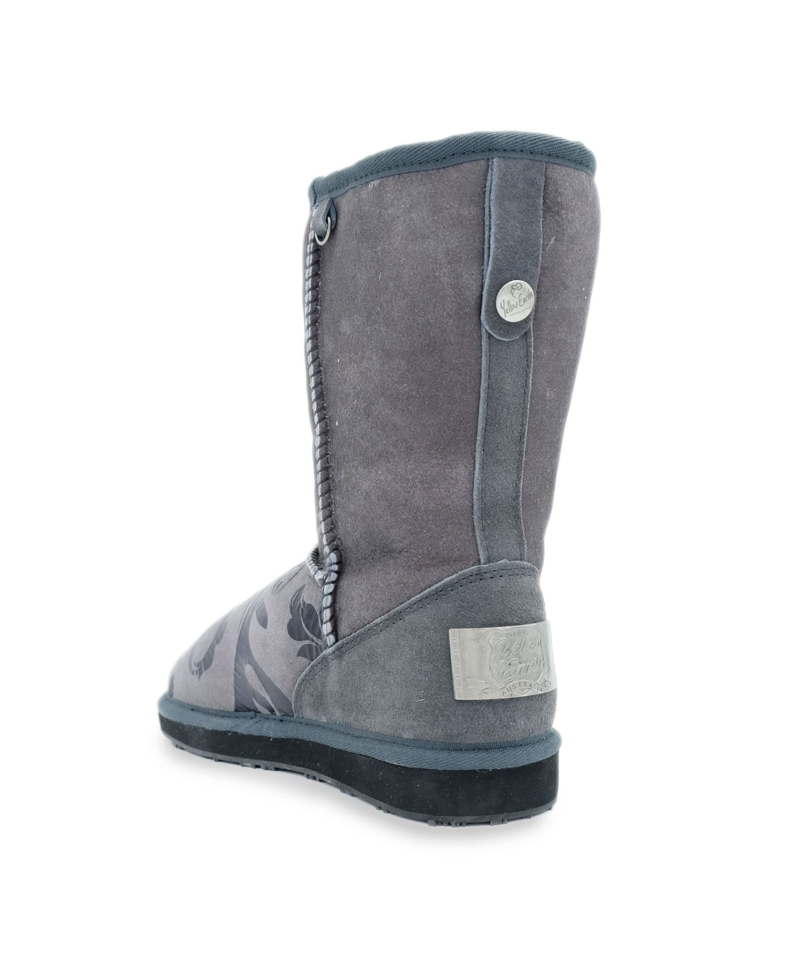 Grey sheepskin wool mid-calf boot with decorative metal badge, rear three-quarter view. - Yellow Earth Australia