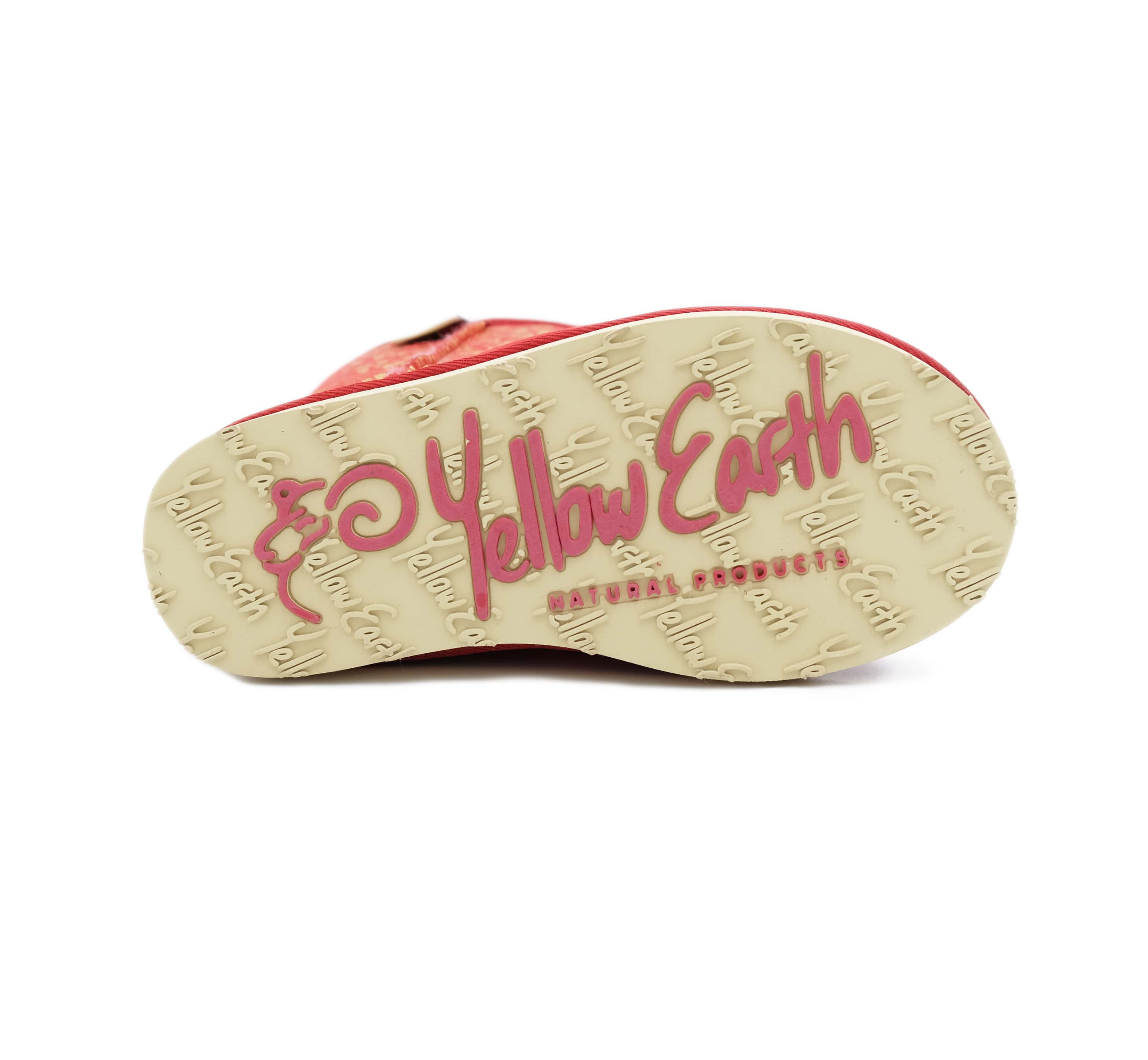 Red sheepskin baby boot sole view showing natural wool lining and grip pattern. - Yellow Earth Australia