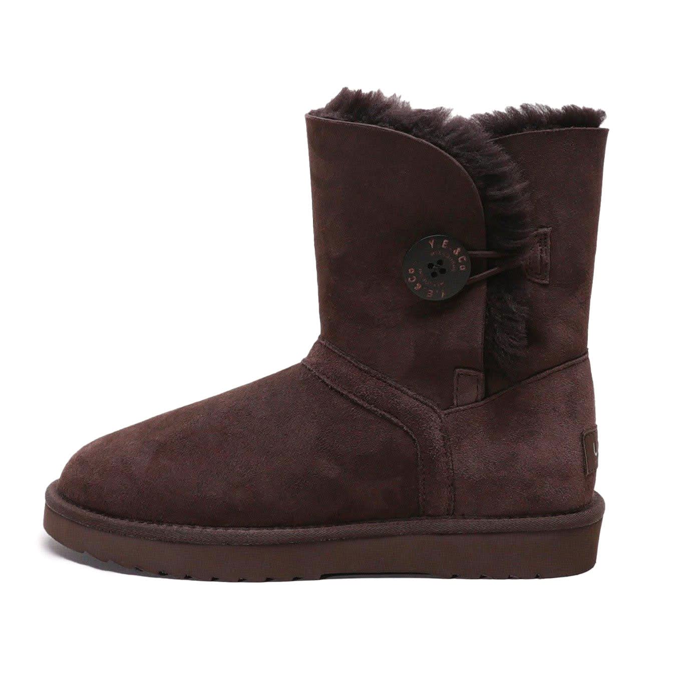 Brown sheepskin boot with button closure and fluffy wool lining, side view. - Yellow Earth Australia