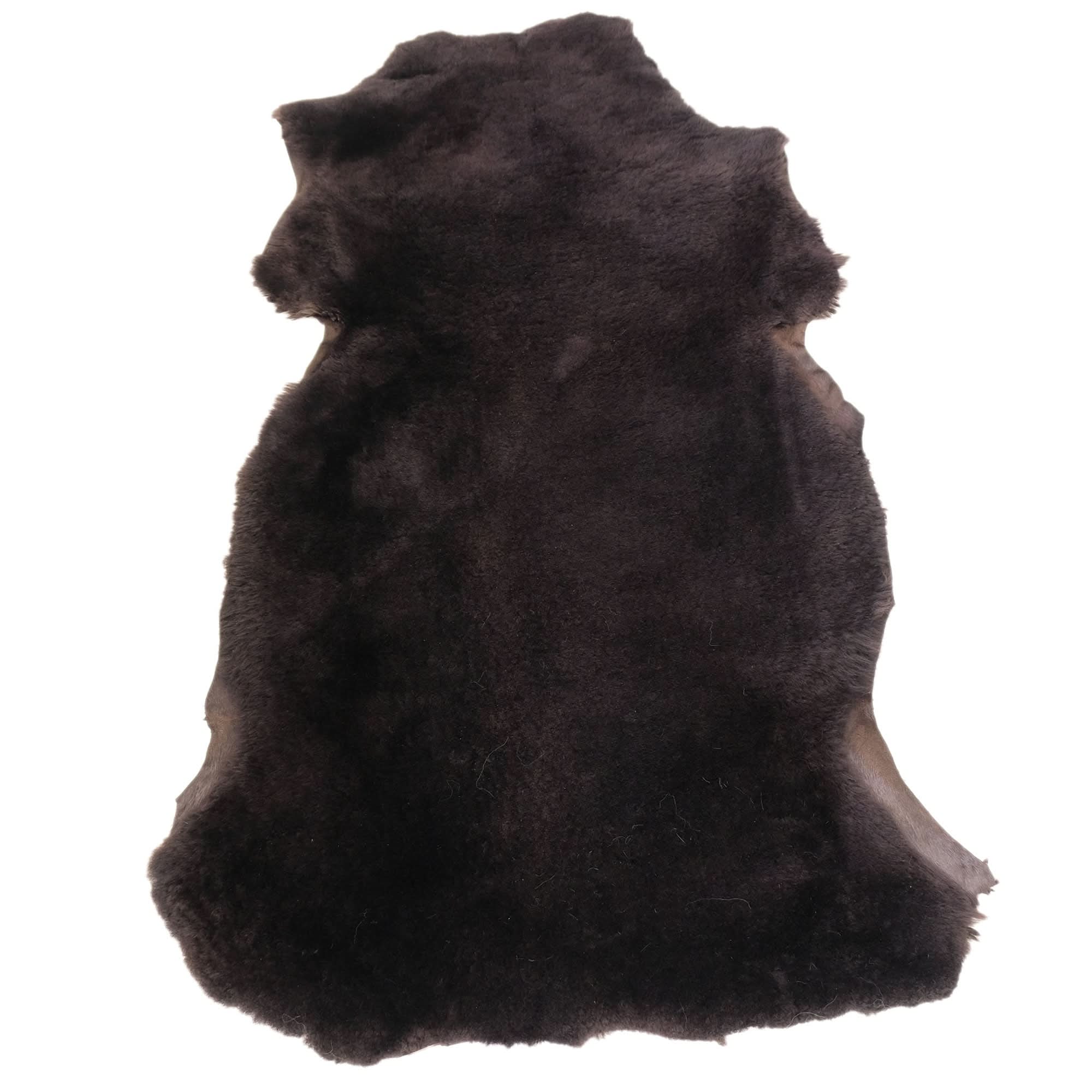 Dark brown sheepskin rug with natural fur texture, displayed flat lay view. - Yellow Earth Australia