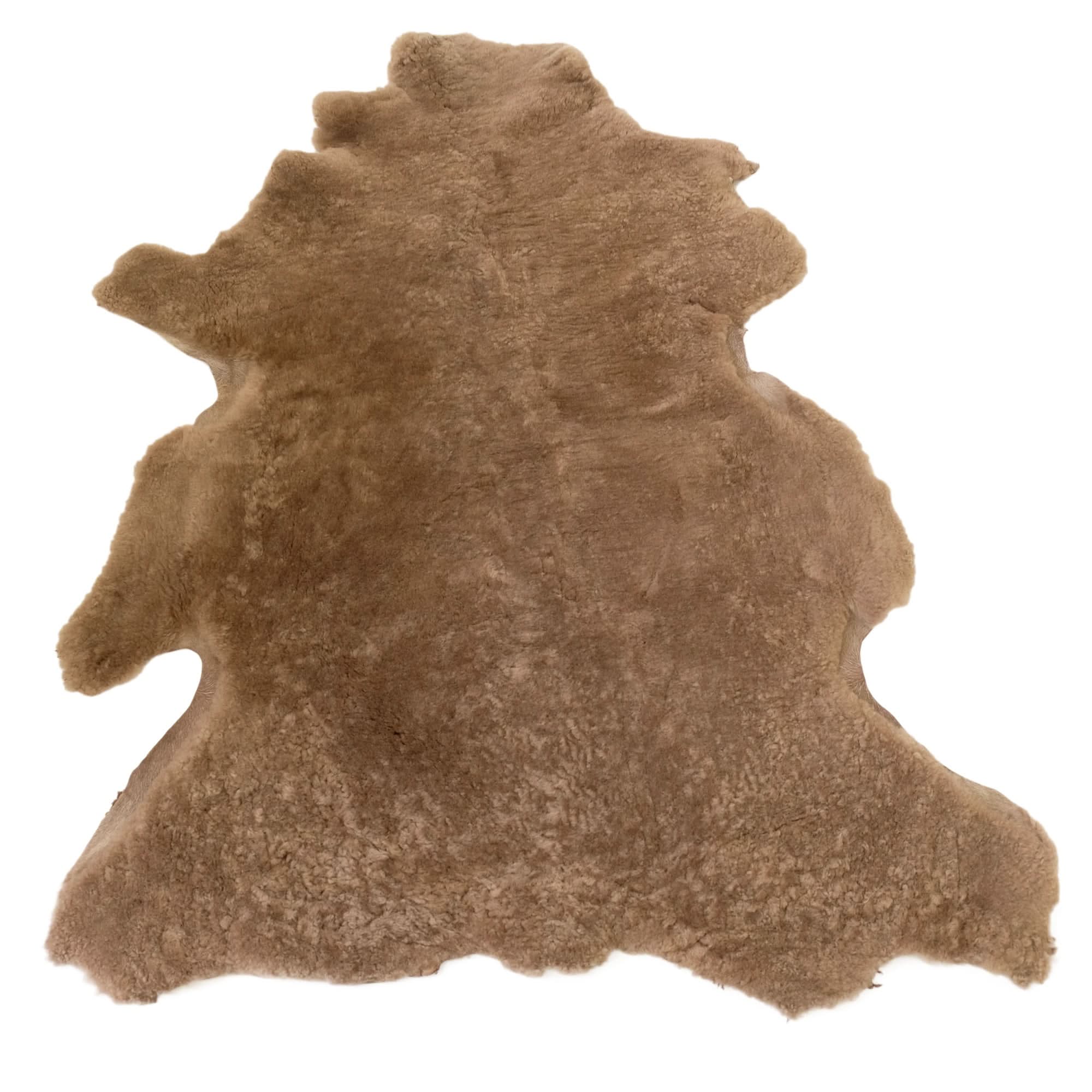 Caramel sheepskin rug with natural wool texture, top view. - Yellow Earth Australia