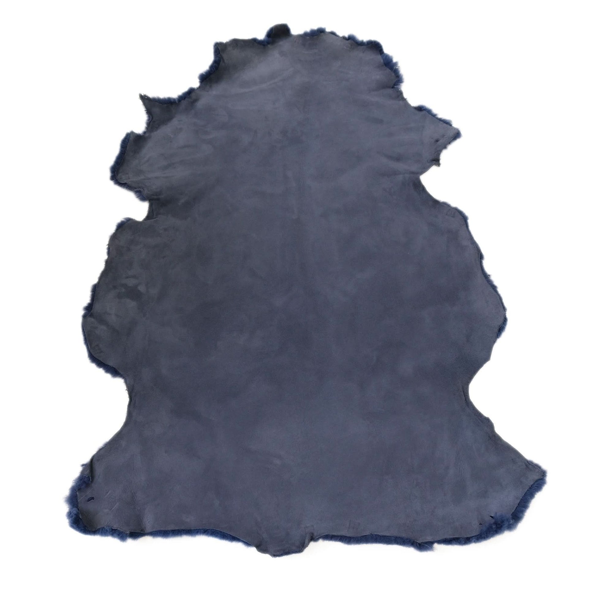 Grey sheepskin rug with natural wool pile displayed flat from above on white background. - Yellow Earth Australia