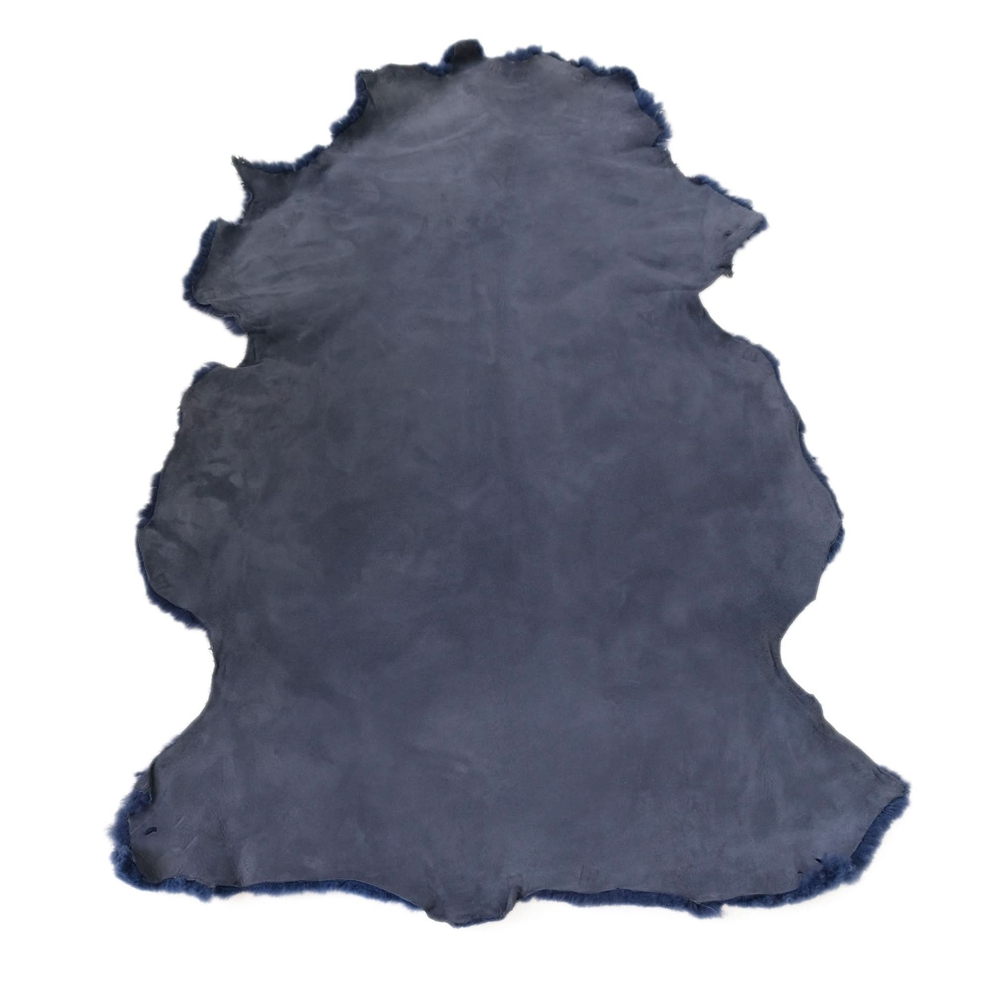 Grey sheepskin rug with natural wool pile displayed flat from above on white background. - Yellow Earth Australia