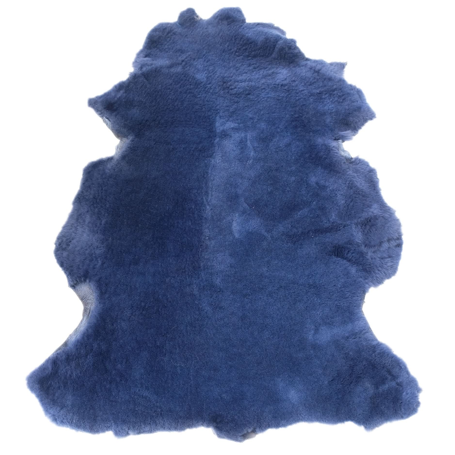 Blue sheepskin rug with natural woolly texture, viewed from above. - Yellow Earth Australia