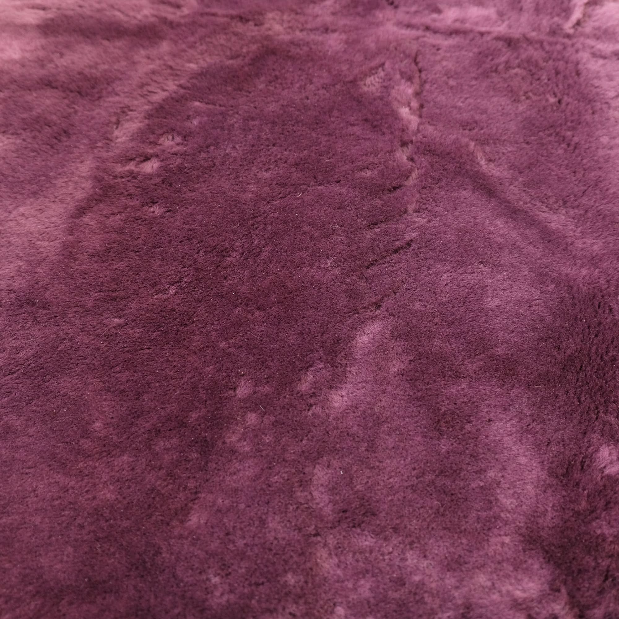 Plush burgundy sheepskin rug with soft wool texture viewed from above. - Yellow Earth Australia