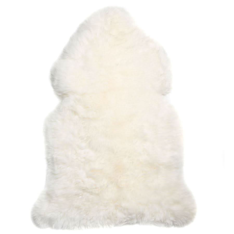 White sheepskin rug with soft wool fleece texture, viewed from above on white background. - Yellow Earth Australia