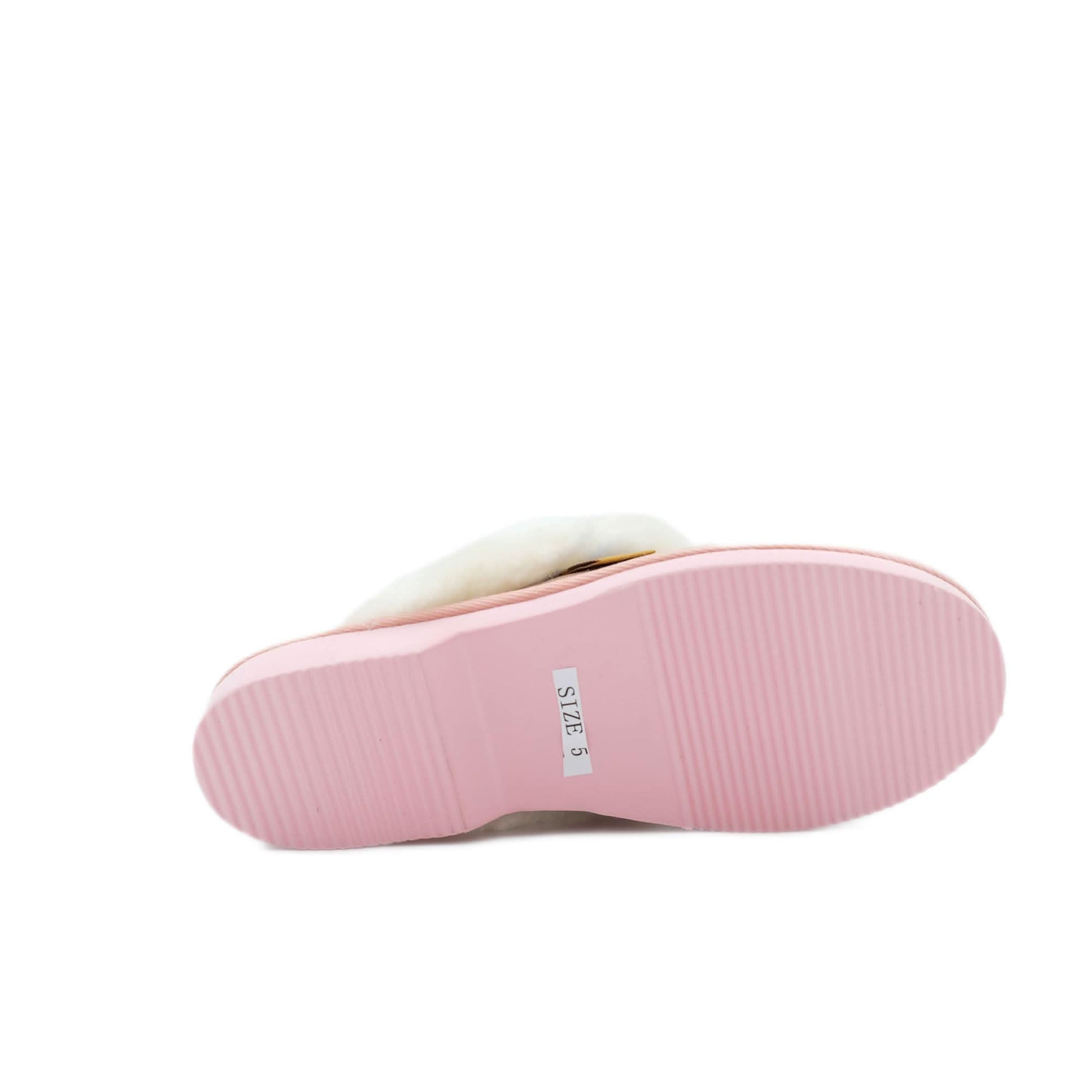Pink sheepskin slipper sole view displaying textured rubber outsole and size label. - Yellow Earth Australia