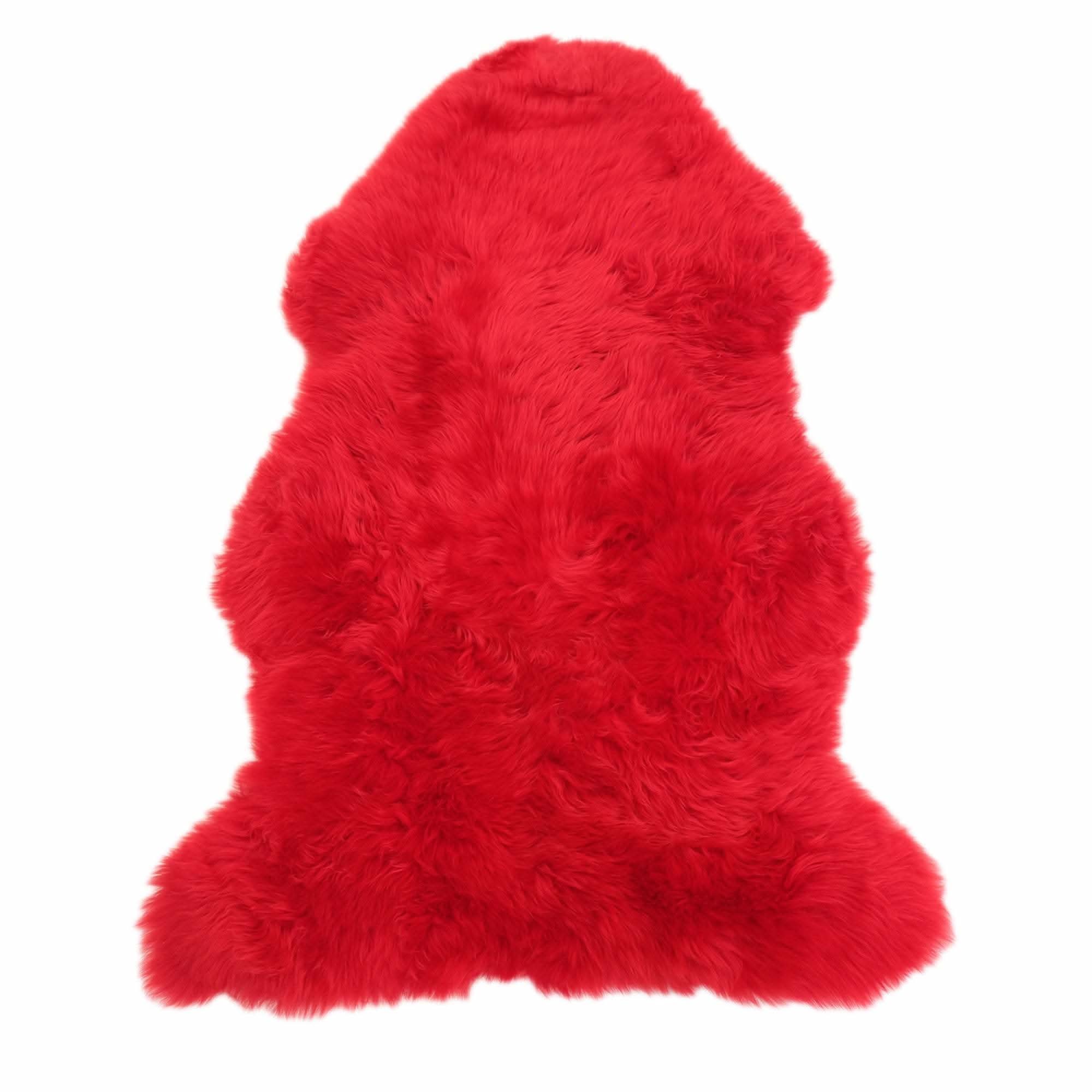Bright red genuine sheepskin rug with thick wool pile, shown from above on white background. - Yellow Earth Australia