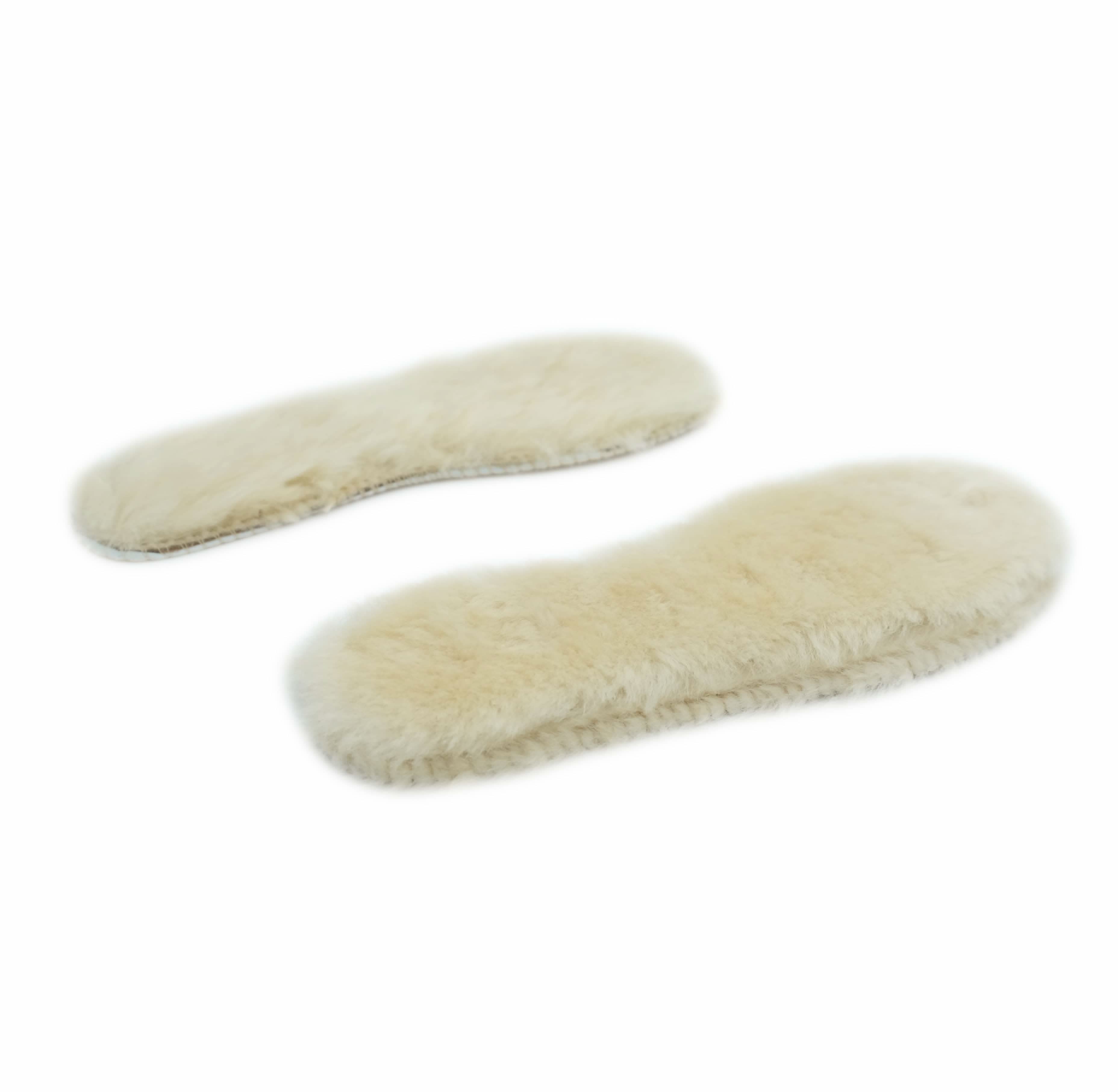 Pair of cream sheepskin wool insoles showing soft fuzzy texture from top view. - Yellow Earth Australia