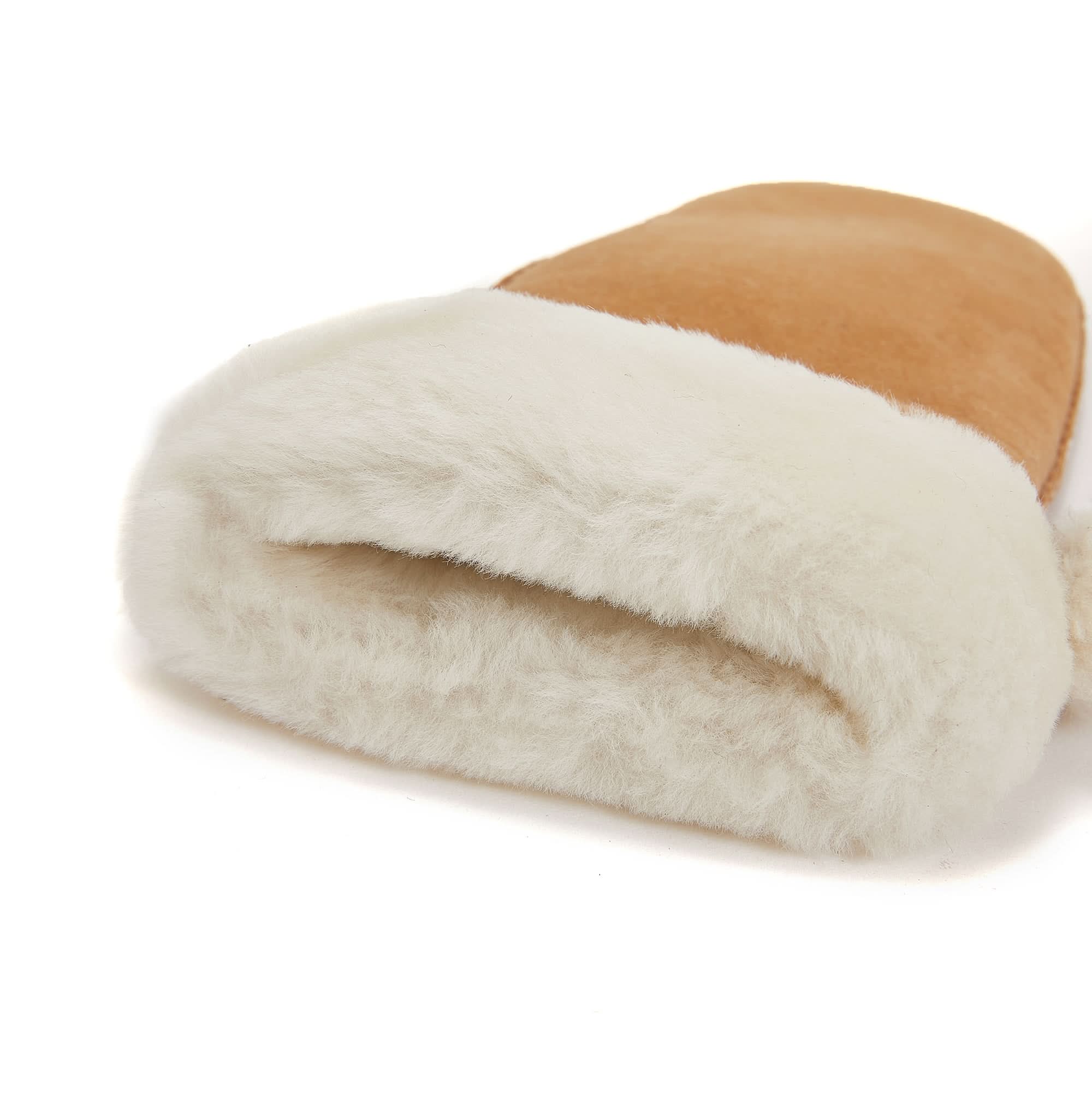 Cream and tan sheepskin slipper with fluffy wool lining, side view. - Yellow Earth Australia