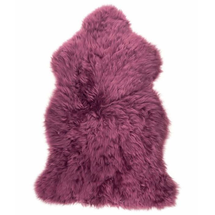 Plum sheepskin rug with luxurious wool pile viewed from above on white background. - Yellow Earth Australia