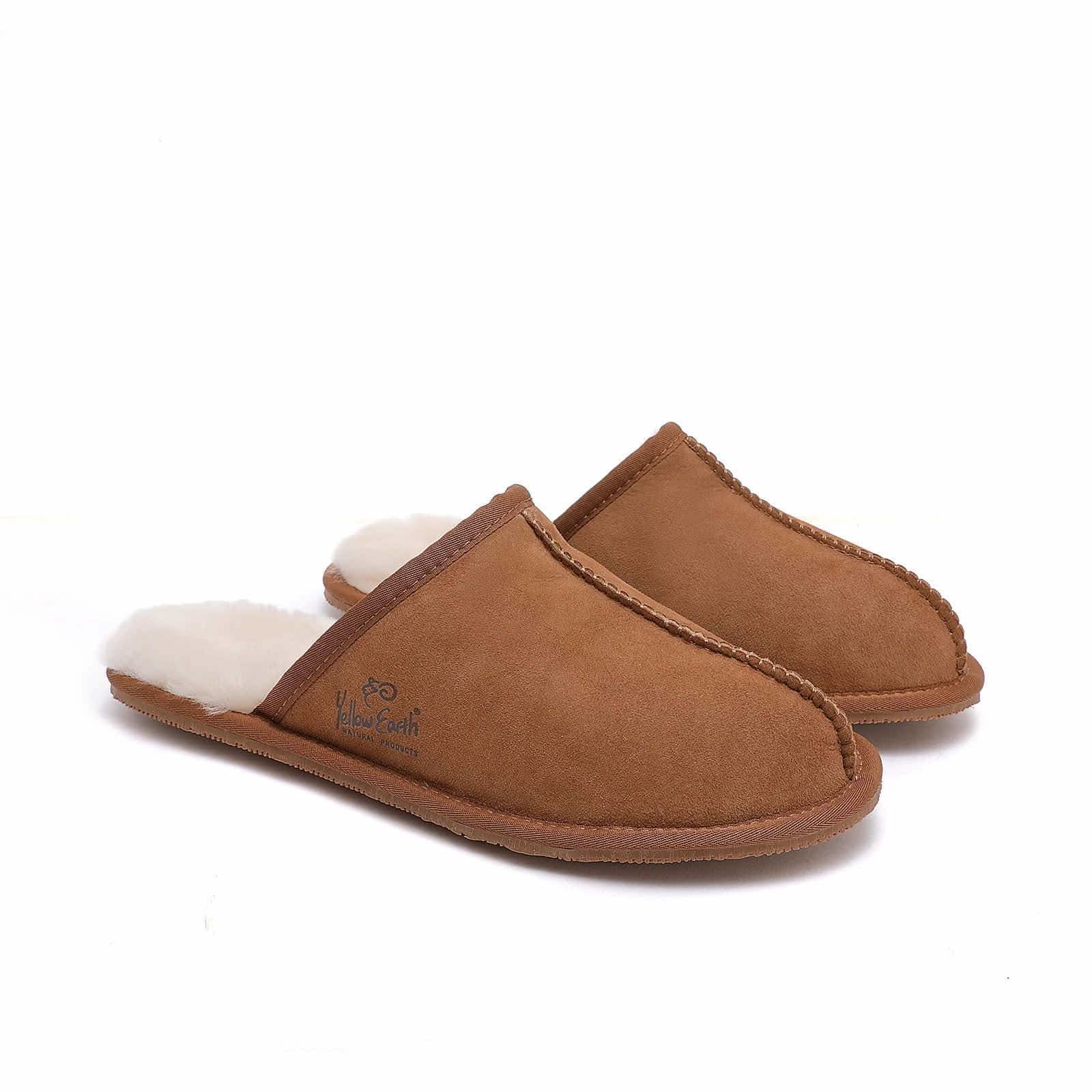 Tan suede sheepskin mule slippers with cream wool lining, angled side view. - Yellow Earth Australia