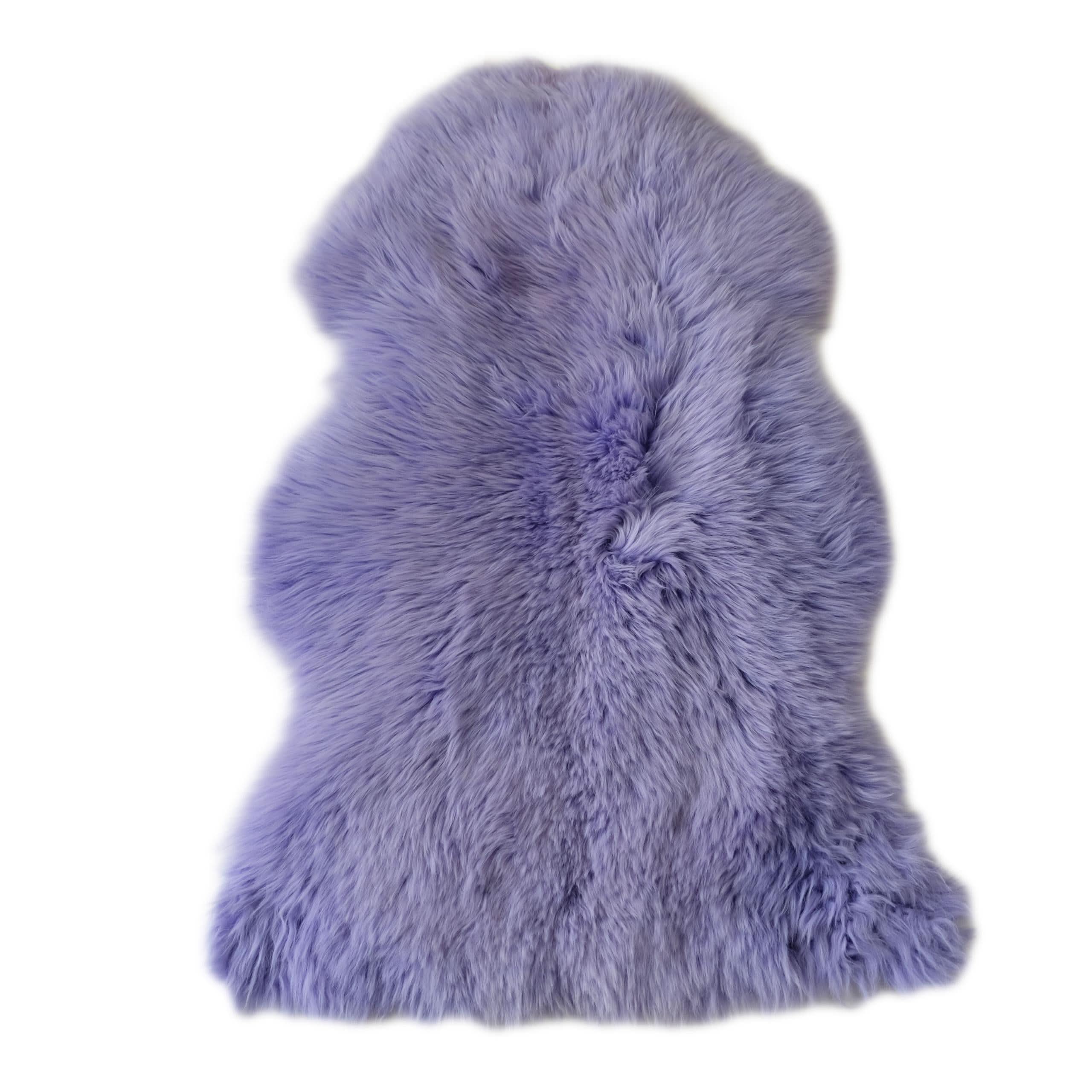 Lavender sheepskin rug with soft wool texture displayed flat against white background. - Yellow Earth Australia