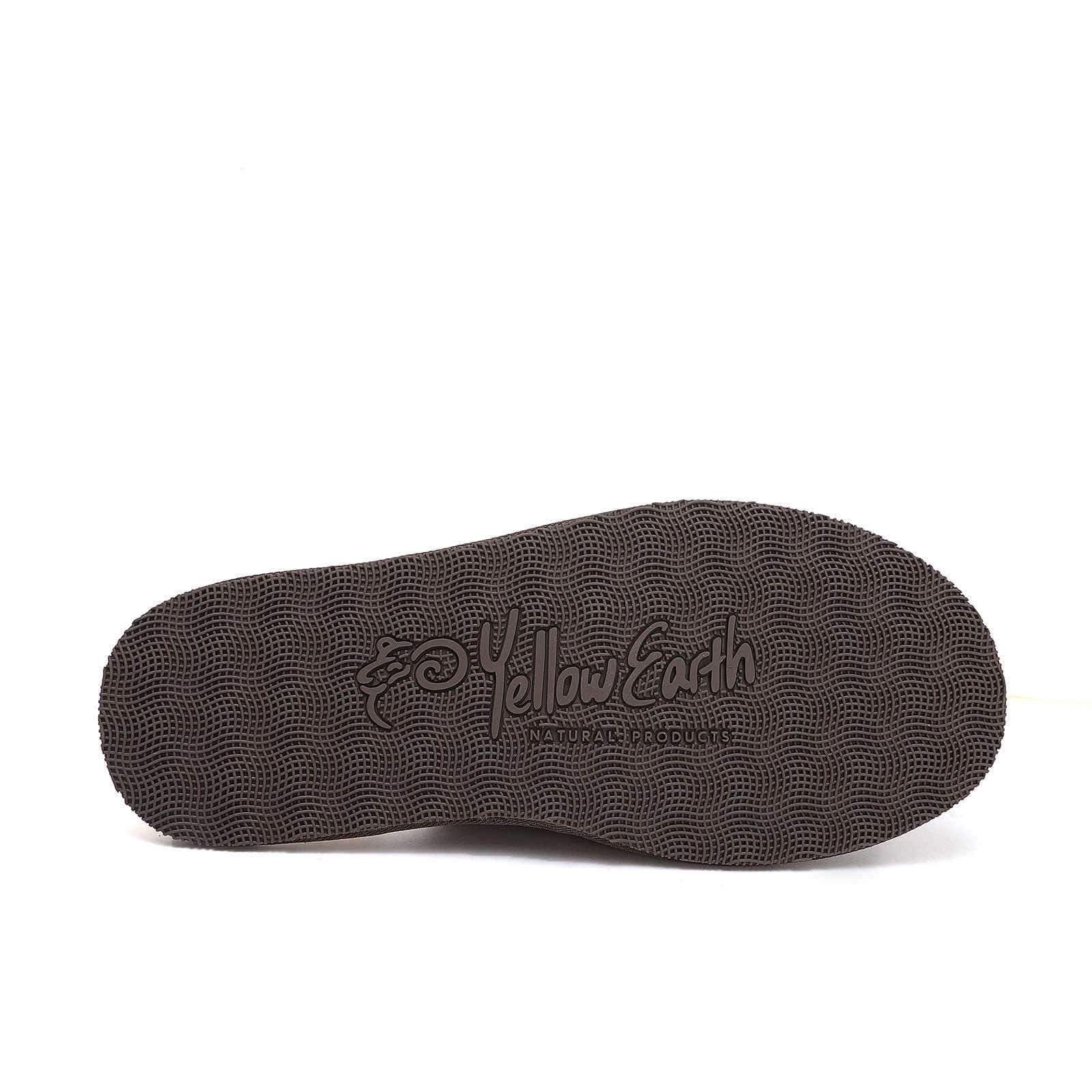 Dark brown textured sole of sheepskin wool slipper viewed from underneath. - Yellow Earth Australia