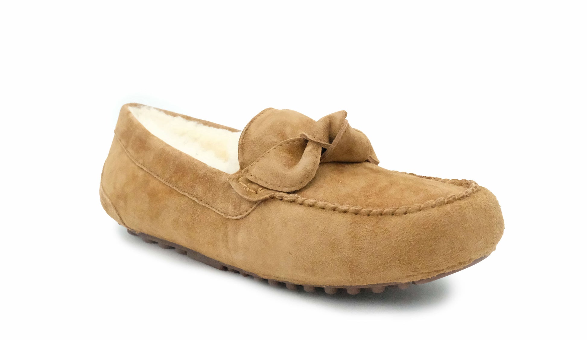 Camel suede moccasin with sheepskin lining and bow detail, side view. - Yellow Earth Australia